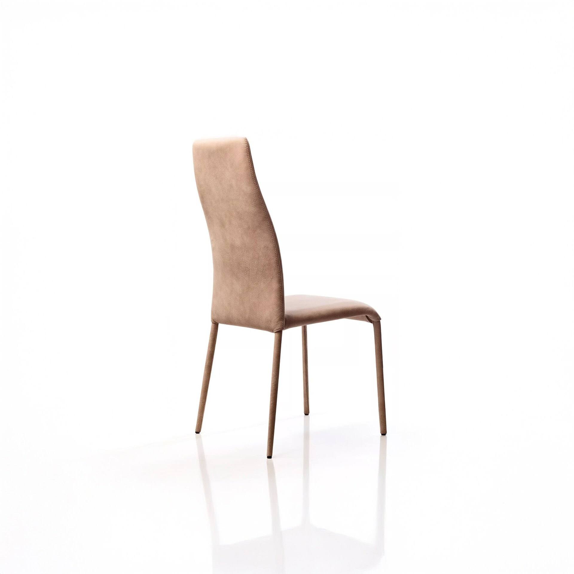 Swing High Back Dining Chair rear view in tan leather with curved backrest.