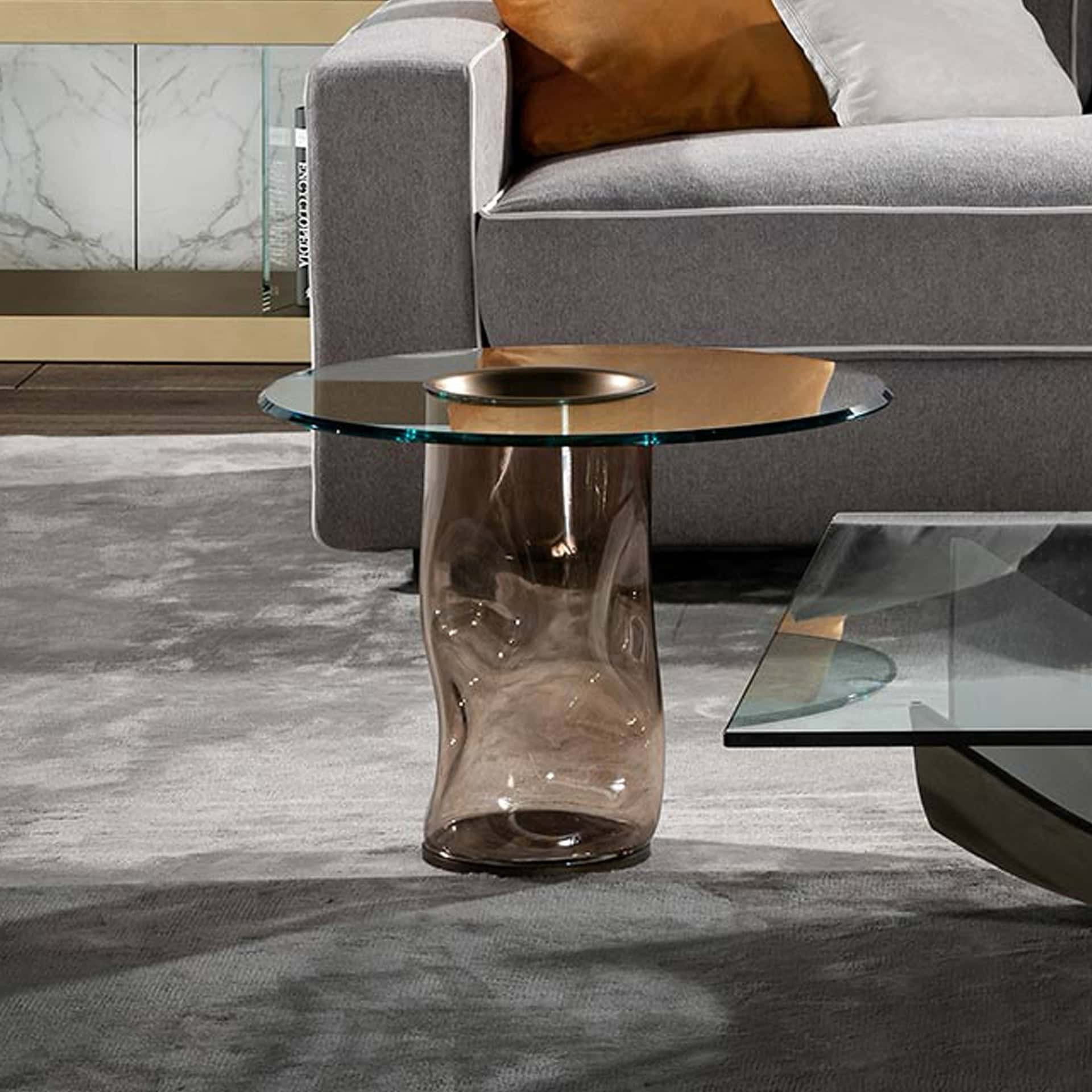 Elegant Murano glass side table with glass top, perfect for modern living rooms.