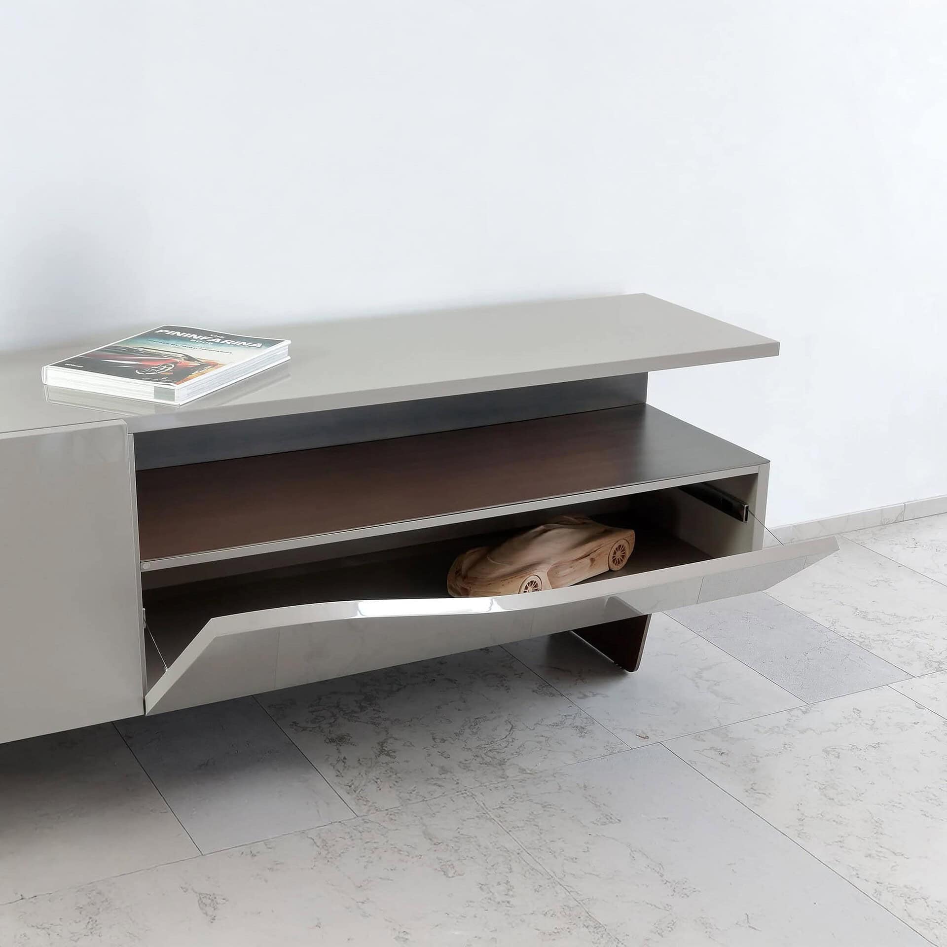 Segno Buffet with open storage compartment and internal glass shelf detail.