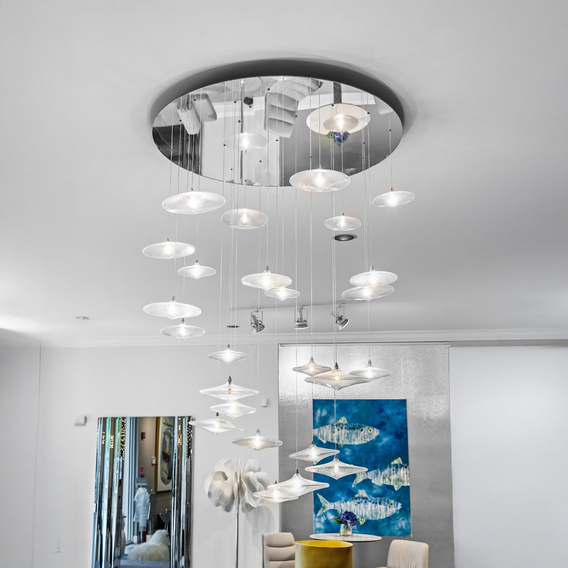 Sirius Modern Glass Chandelier with mirrored ceiling mount and suspended glowing disks.