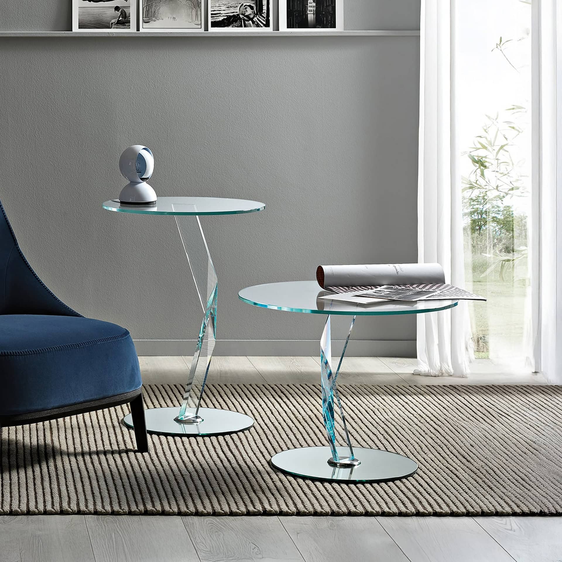 Elegant glass side tables with twisted bases for contemporary home decor.