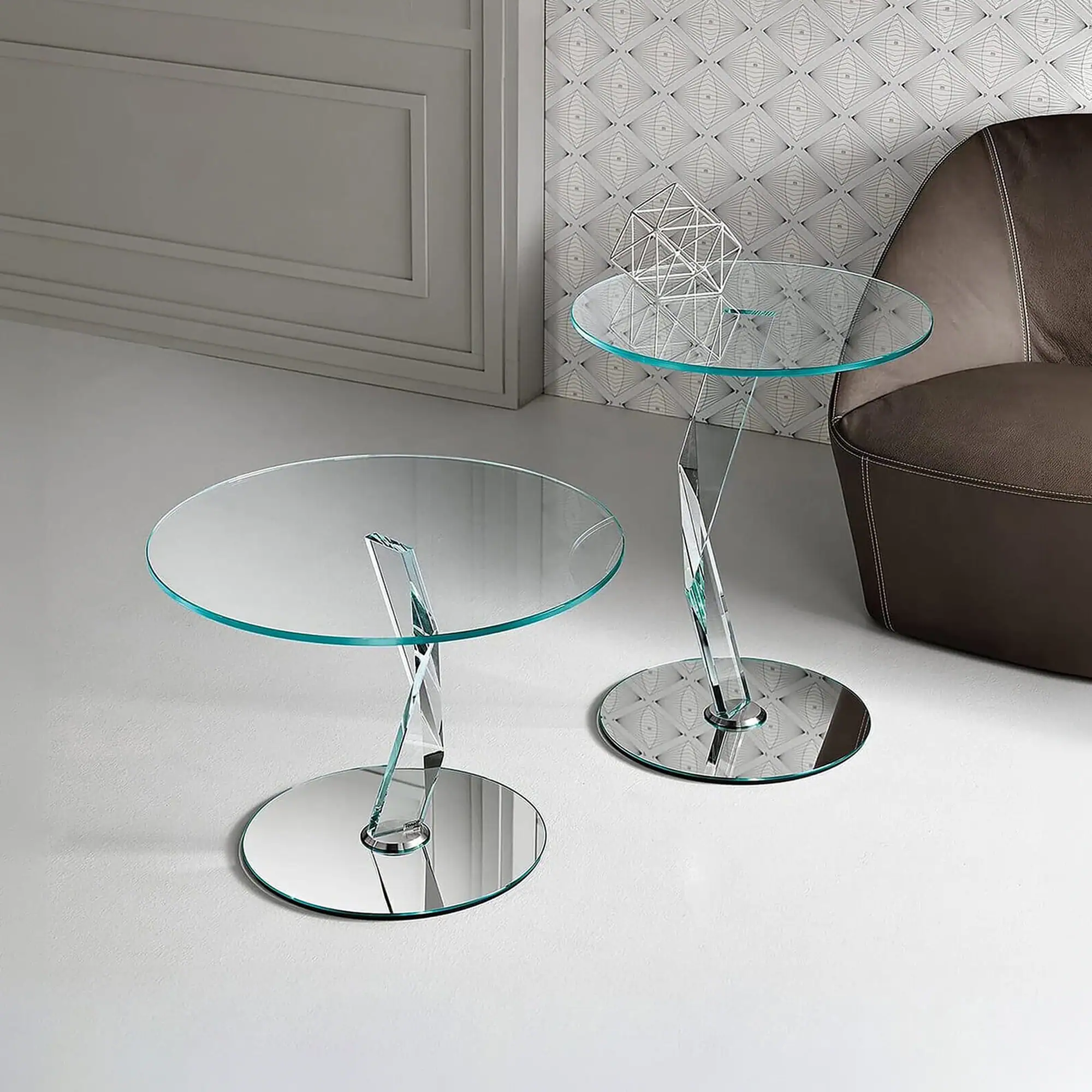 Sklar Furnishings glass side tables with chrome bases in modern living room.