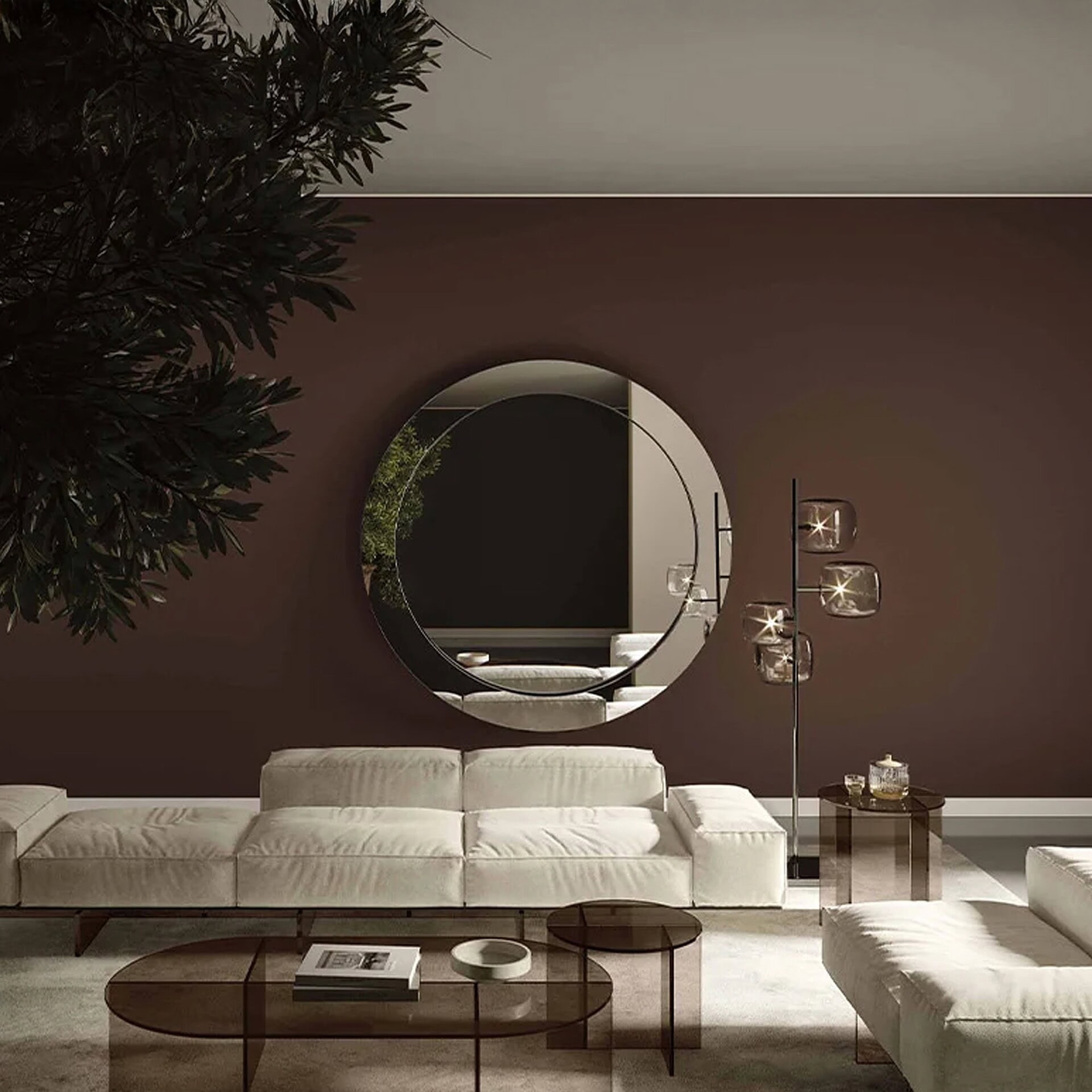 Round Gerundio wall mirror styled in a warm, contemporary living room with wood finishes.