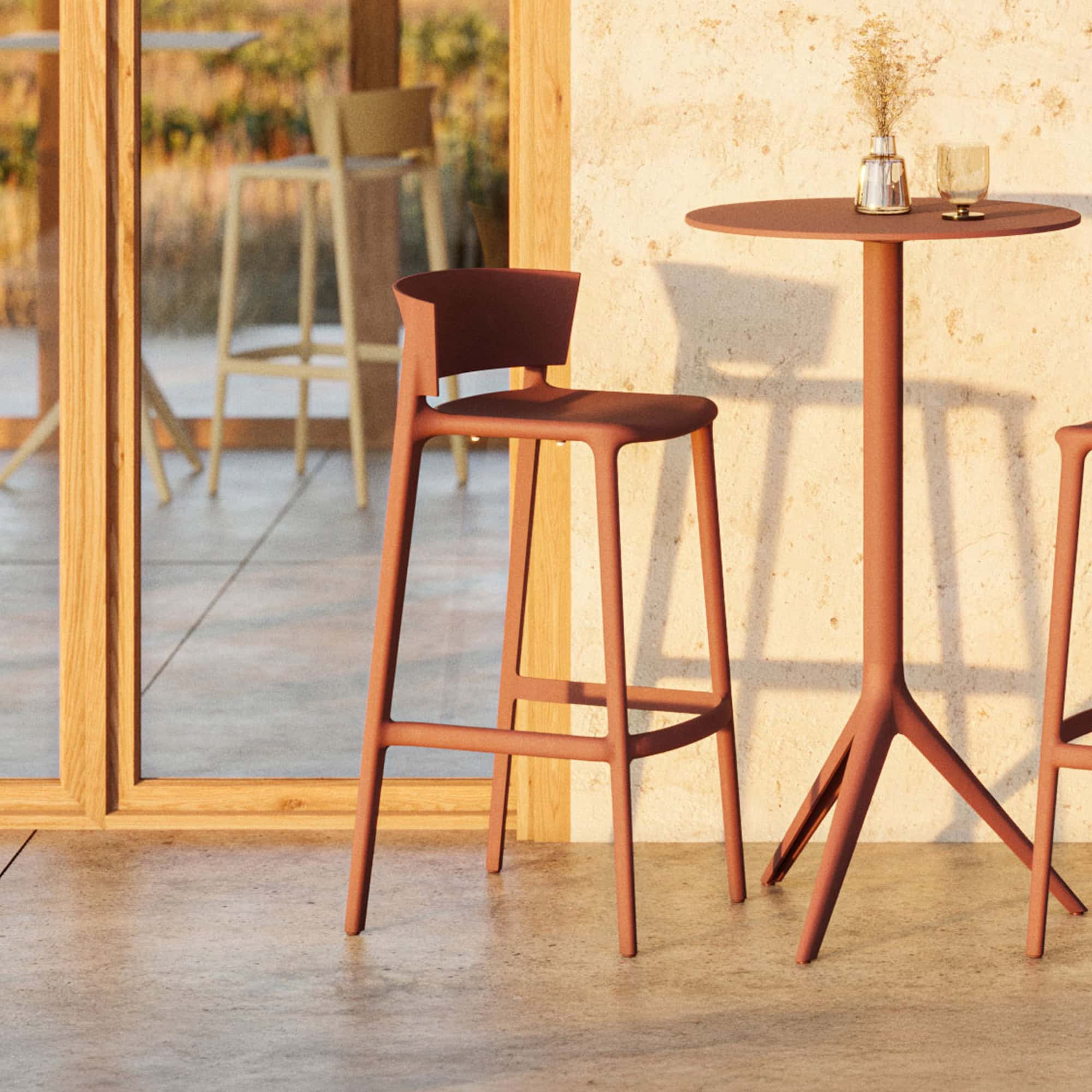 Elegant wooden bar stool and table for contemporary home or cafe decor.