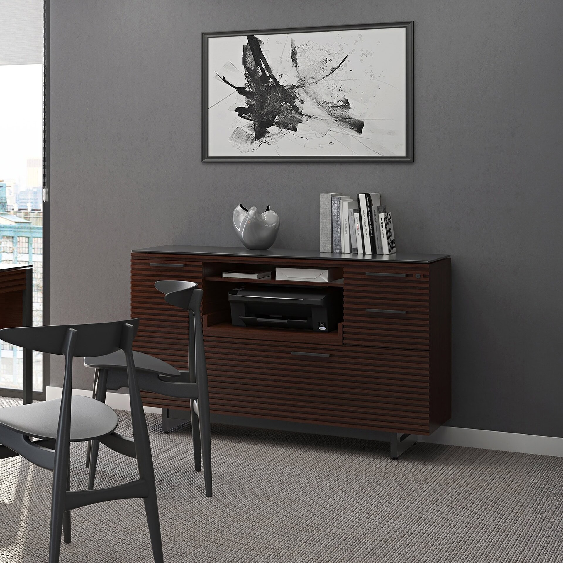 Sleek modern office with dark wood sideboard and abstract artwork, ideal for contemporary workspace design.
