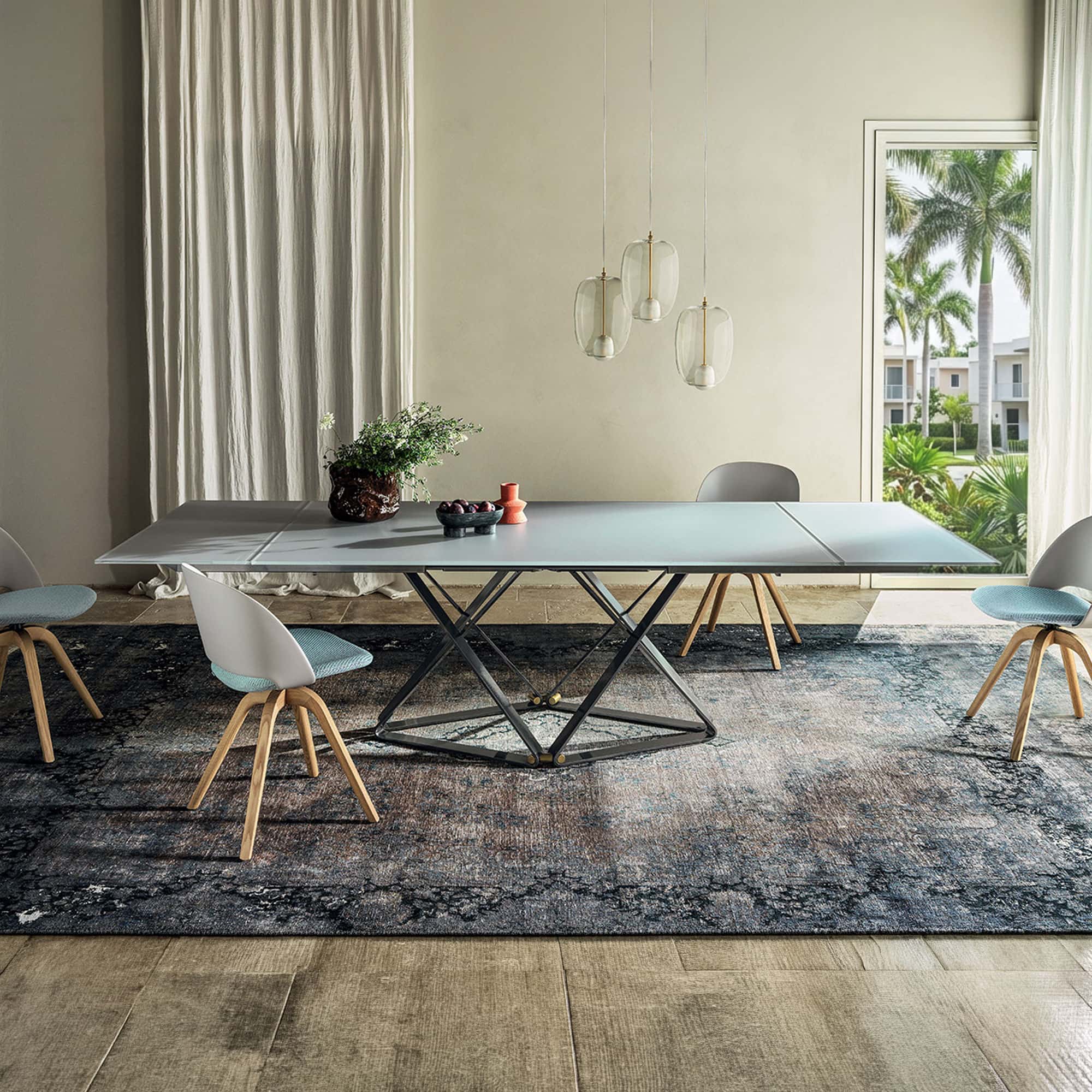 Extendable dining table with sleek design, perfect for modern dining rooms and gatherings.