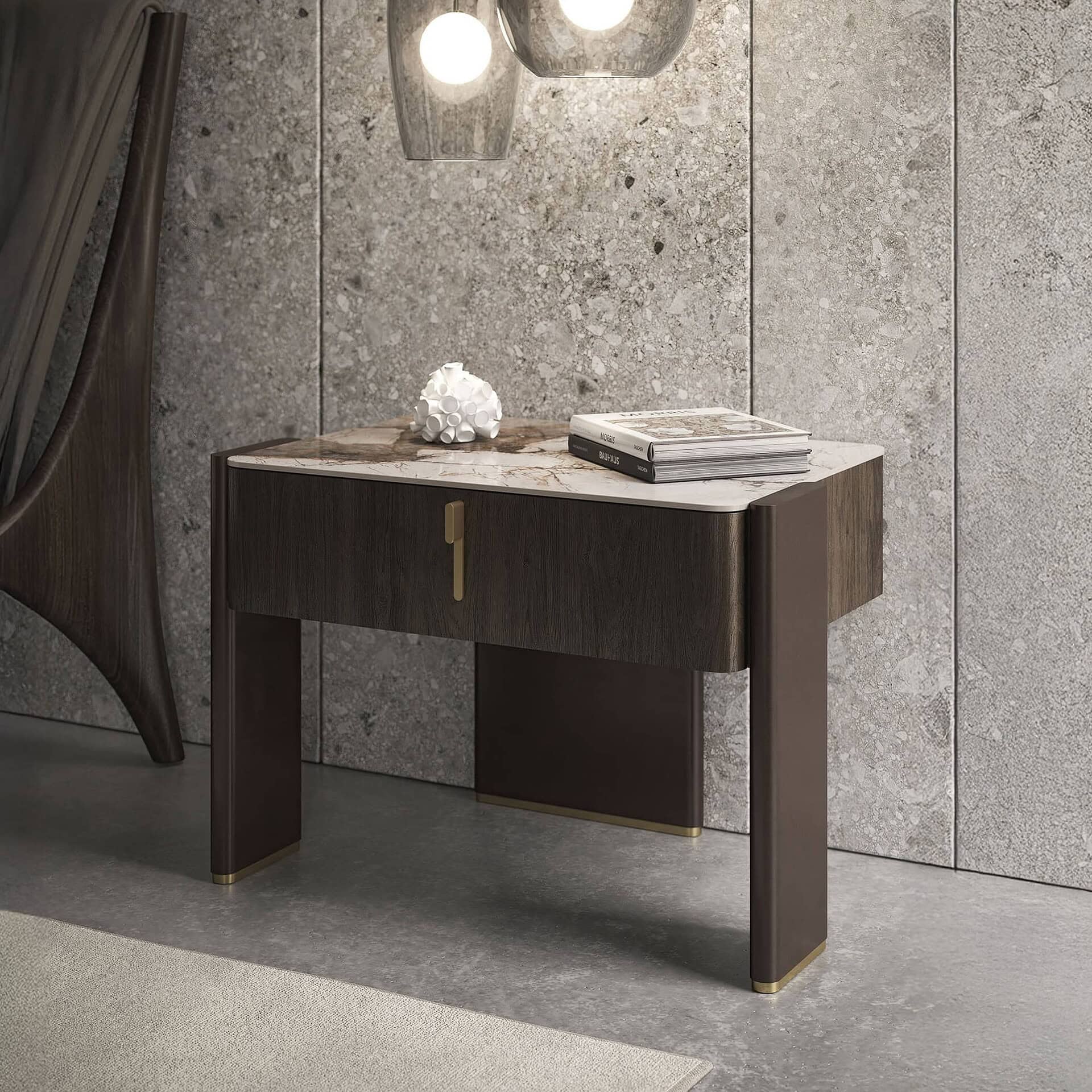 Angled view of Julian 1-Drawer Nightstand with walnut drawer and ceramic top, styled in a modern bedroom with concrete walls and pendant lights.