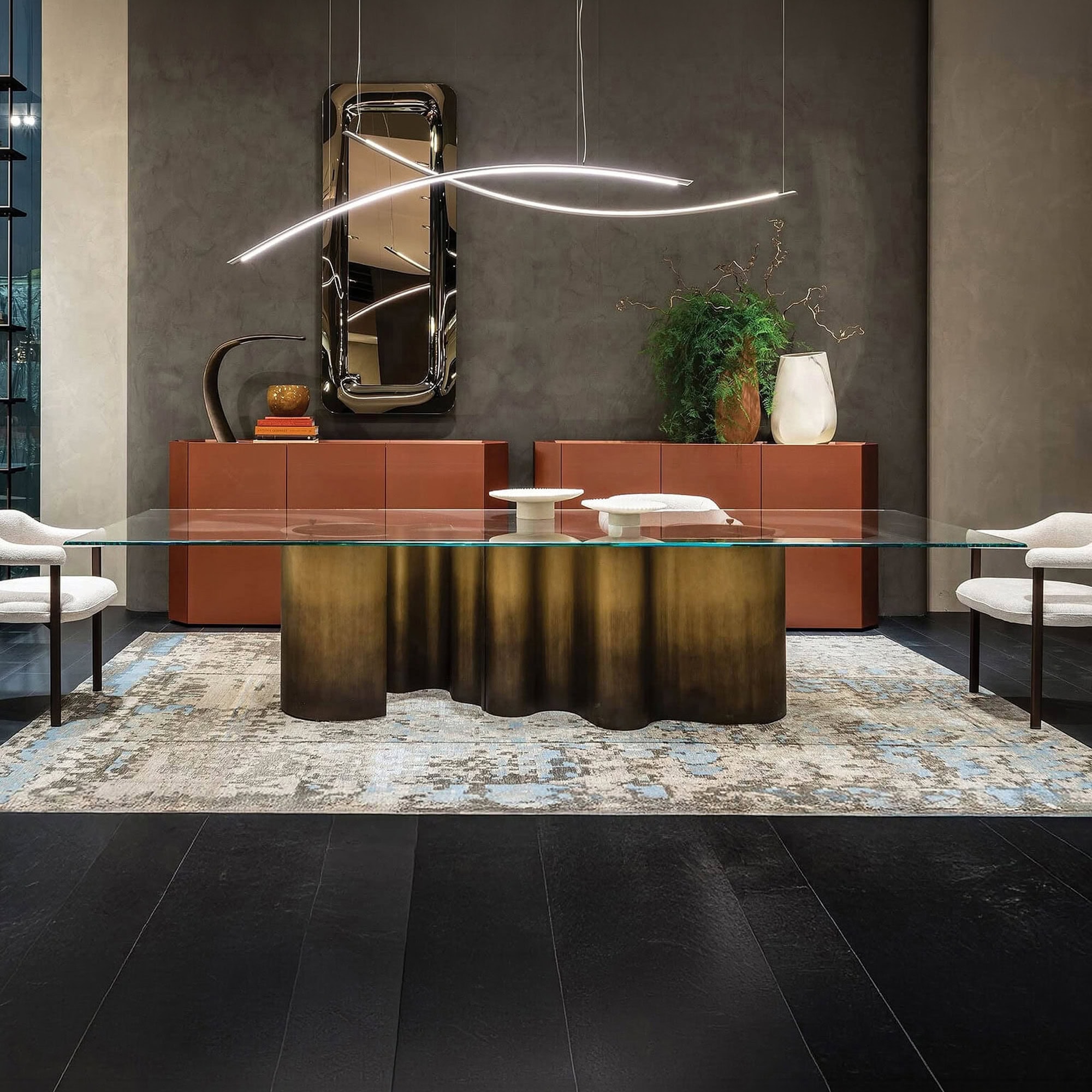 Elegant Papel Sculptural Dining Table with a glass top and sculptural base, perfect for contemporary.