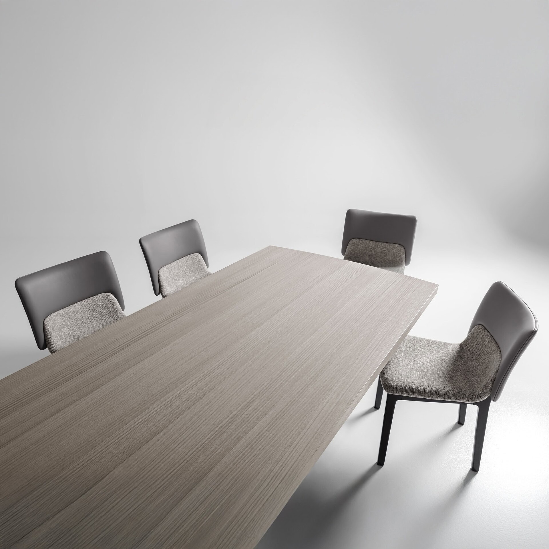 Nora Dining Chairs styled around a large wood dining table.