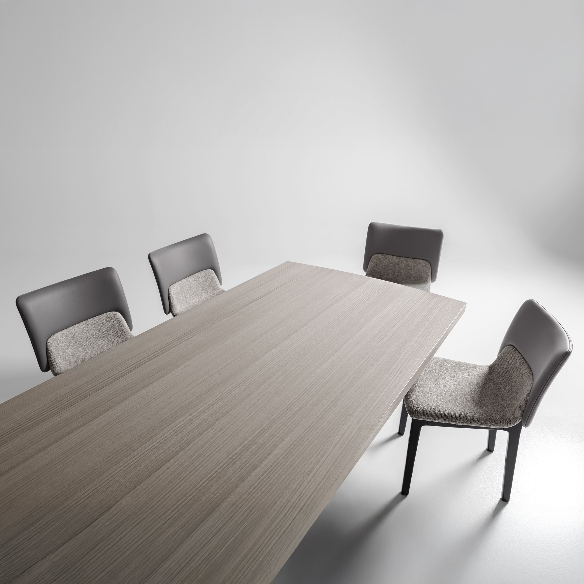 Nora Dining Chairs styled around a large wood dining table.