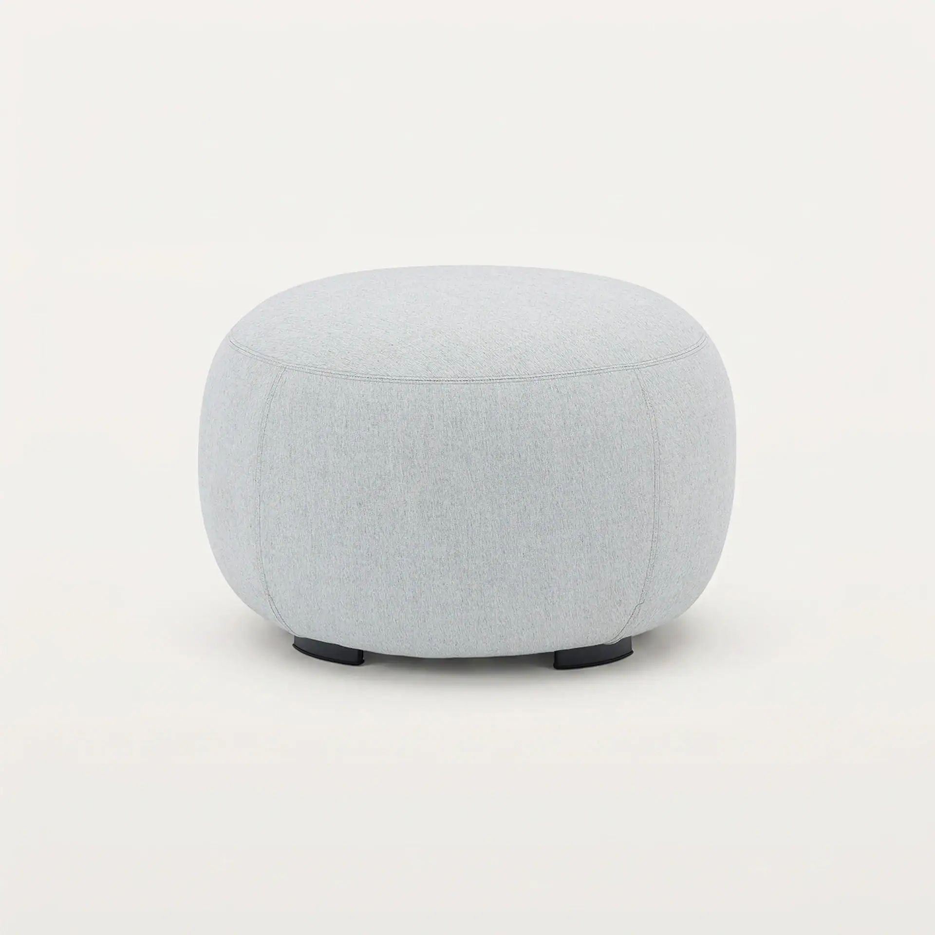 Yellow outdoor ottoman with rounded design for patio seating.