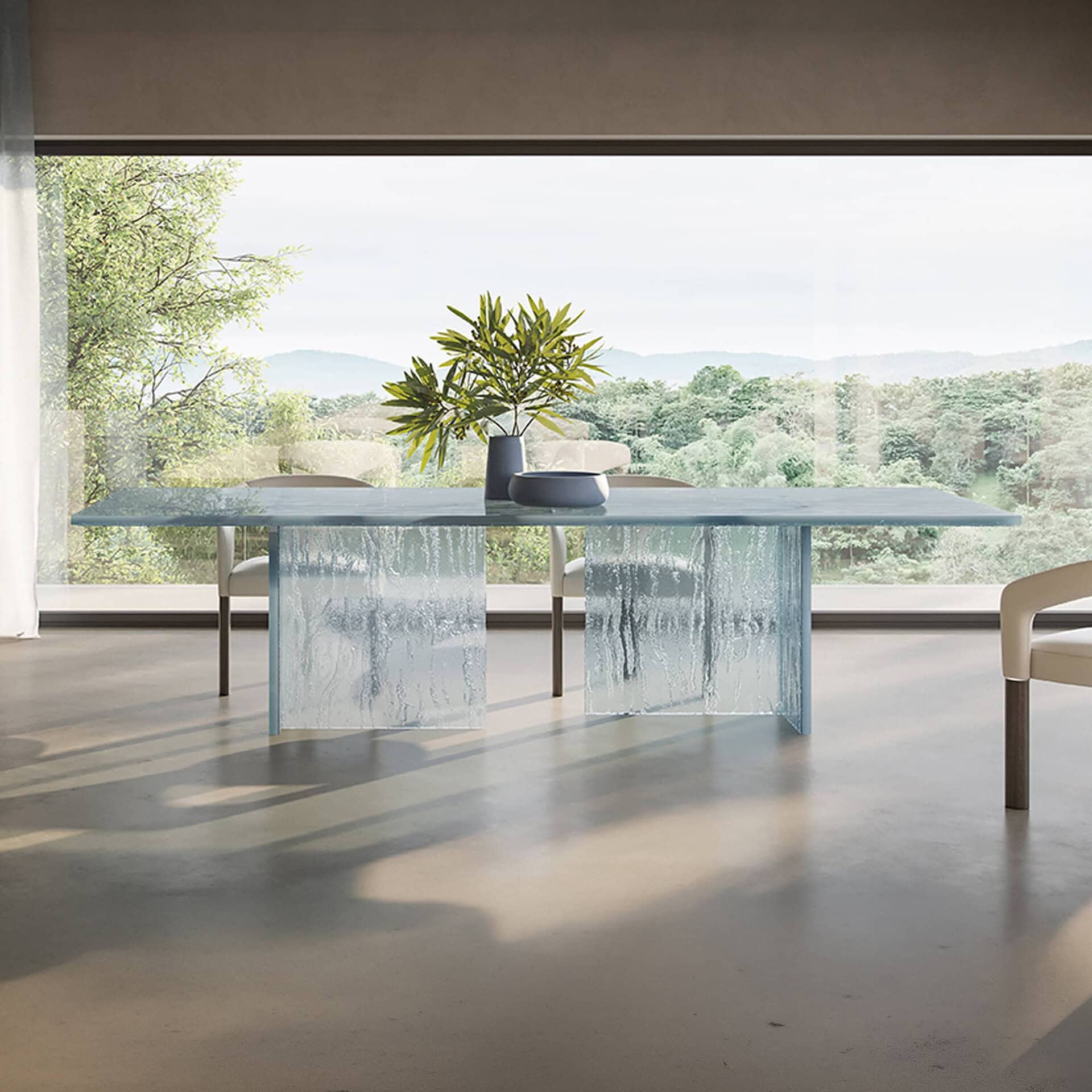 Laguna 72 glass dining table with modern design and clear glass finish. Perfect for contemporary din.