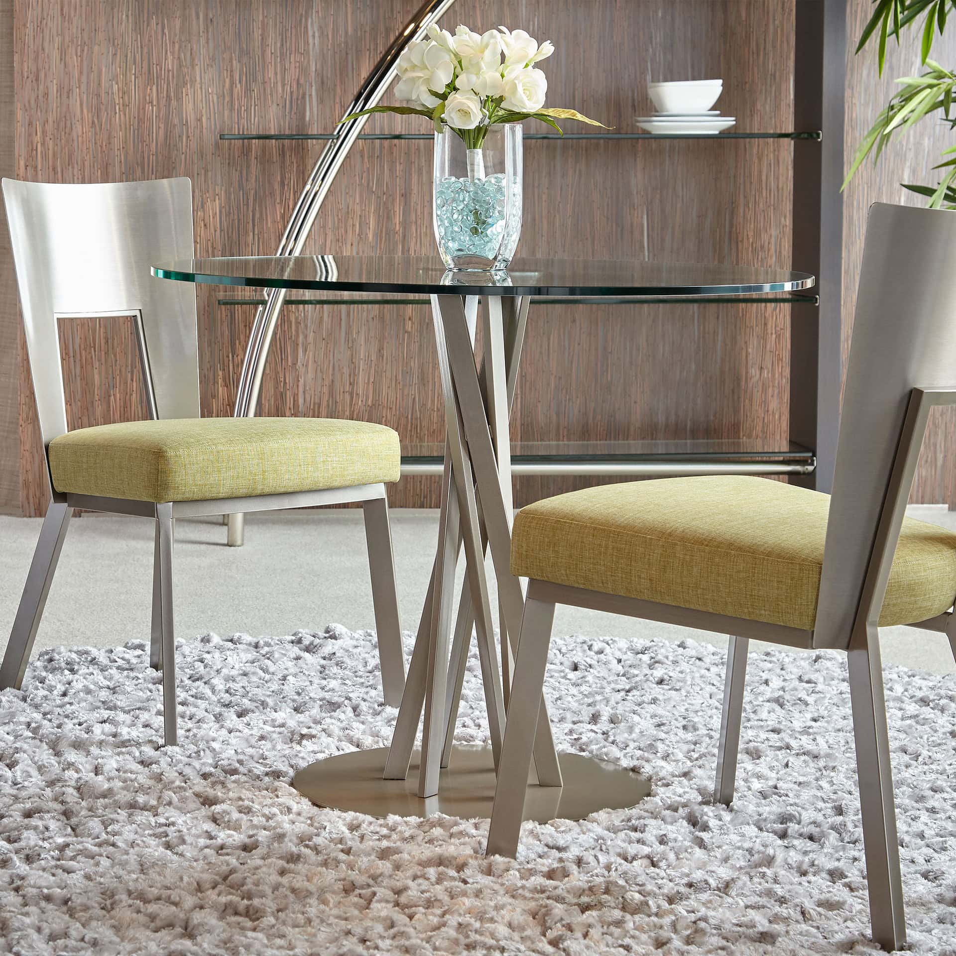 Modern upholstered dining chairs with lime green fabric and sleek wooden legs.