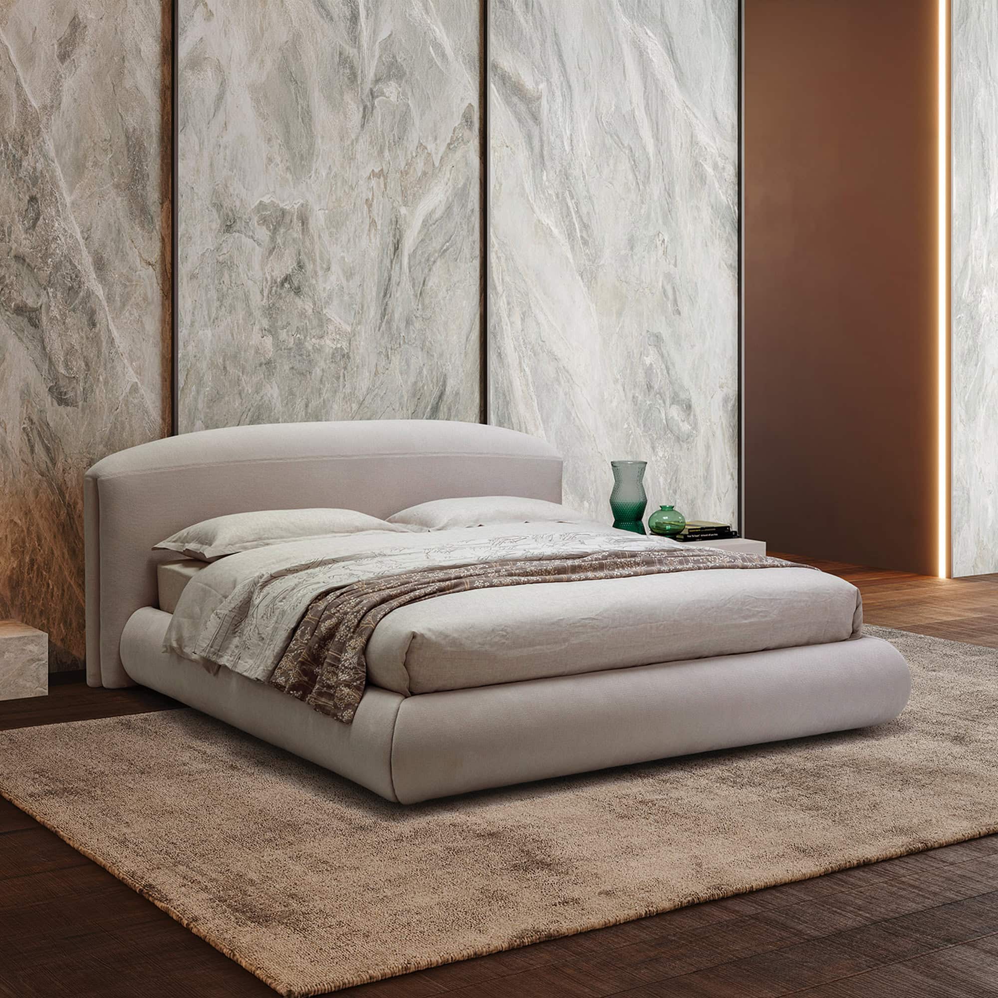 Modern Quentin upholstered platform bed with sleek design and plush fabric.
