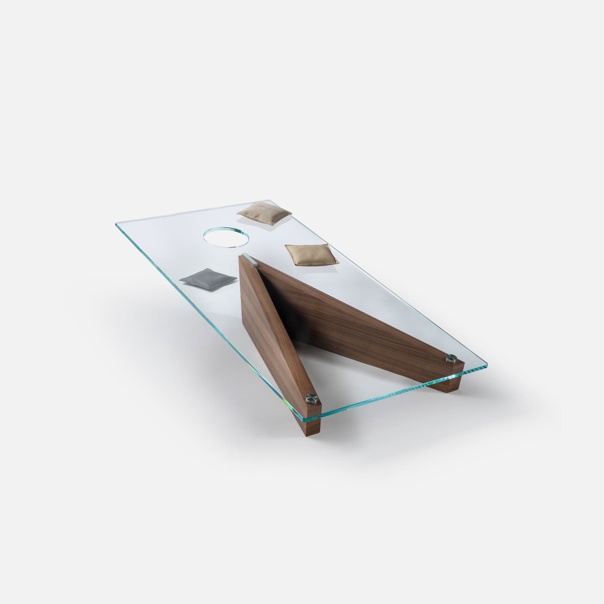 Sleek modern glass coffee table with wooden accents, stylish and contemporary design for living rooms.
