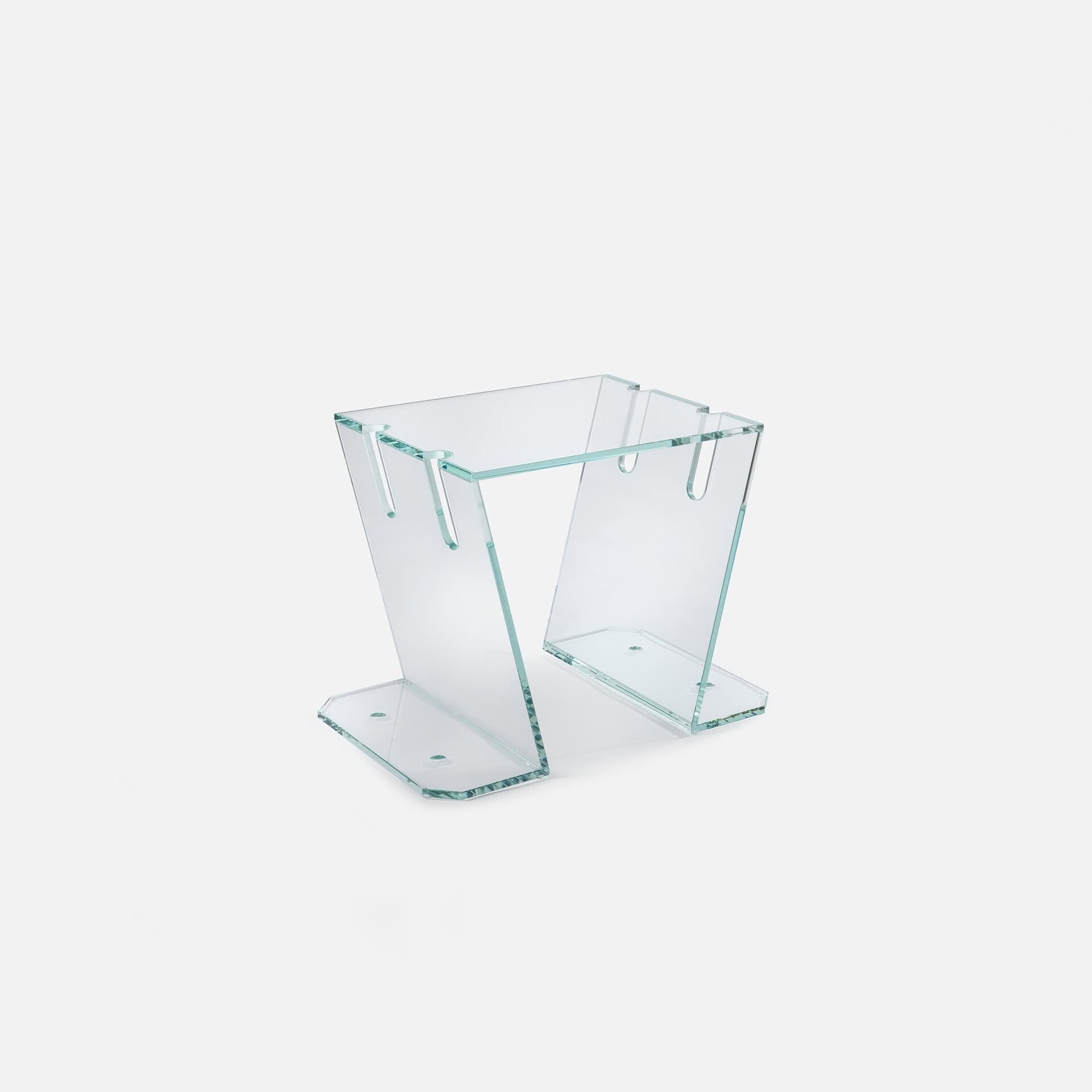Elegant clear glass side table for modern living spaces.