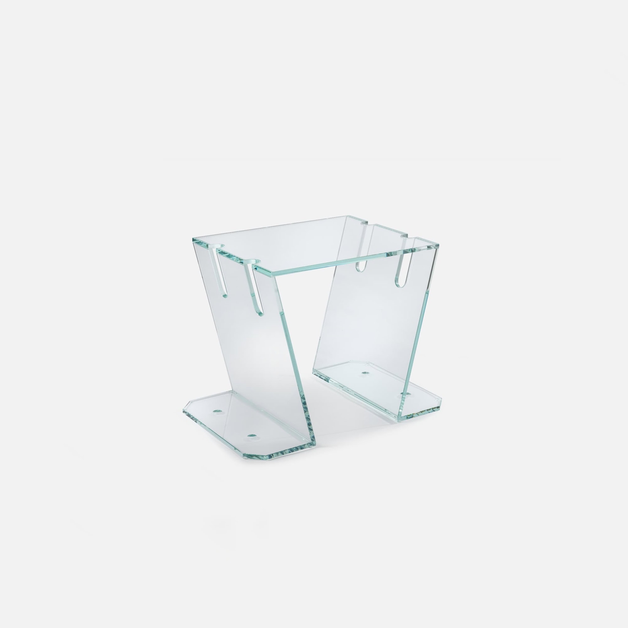 Elegant clear glass side table for modern living spaces.