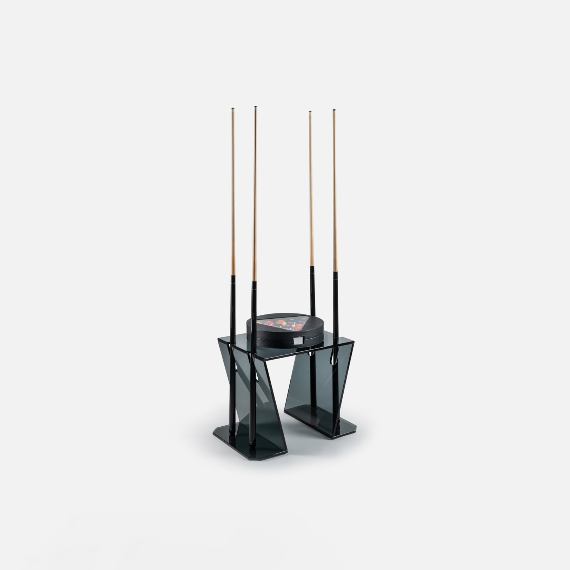 Modern pool cue rack with black glass and wooden cues for stylish game room decor.