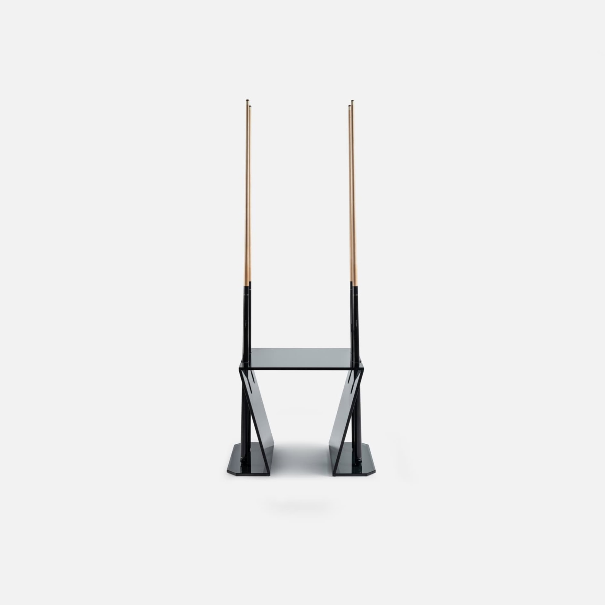 Modern black and wood pool cue holder with sleek design, perfect for stylish game rooms.