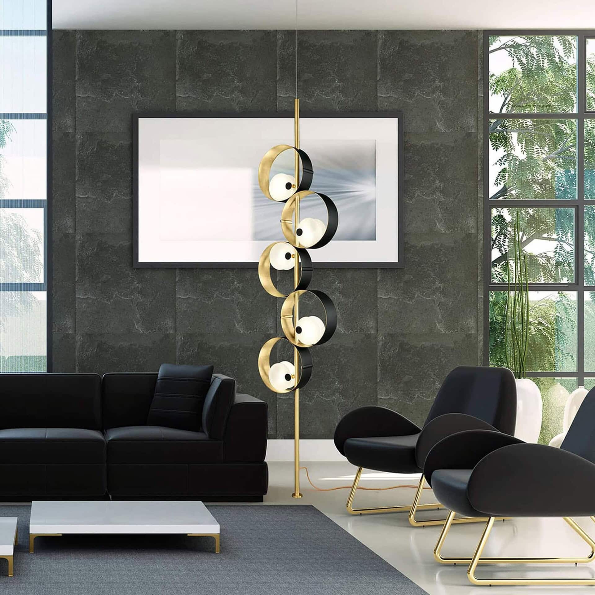Elegant Masiero chandelier with gold and black accents in contemporary living space.