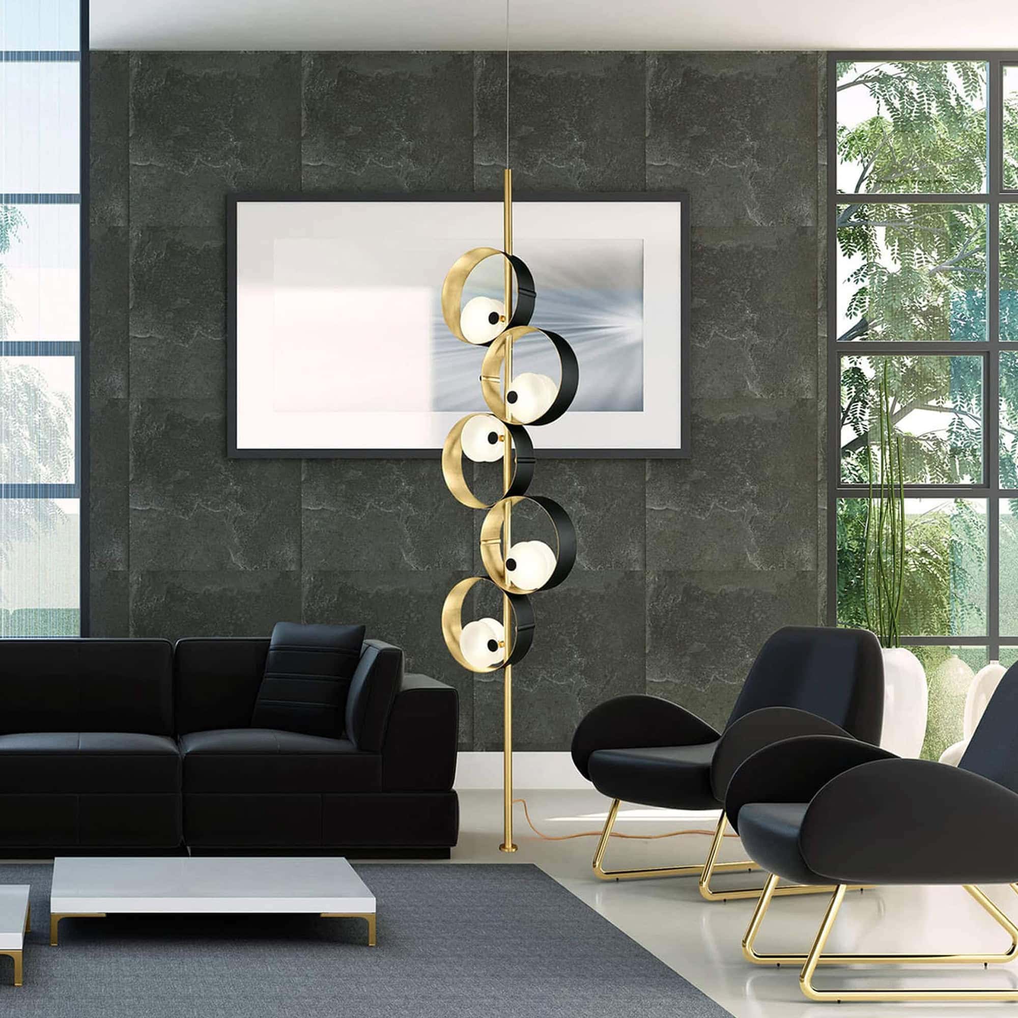 Elegant Masiero chandelier with gold and black accents in contemporary living space.