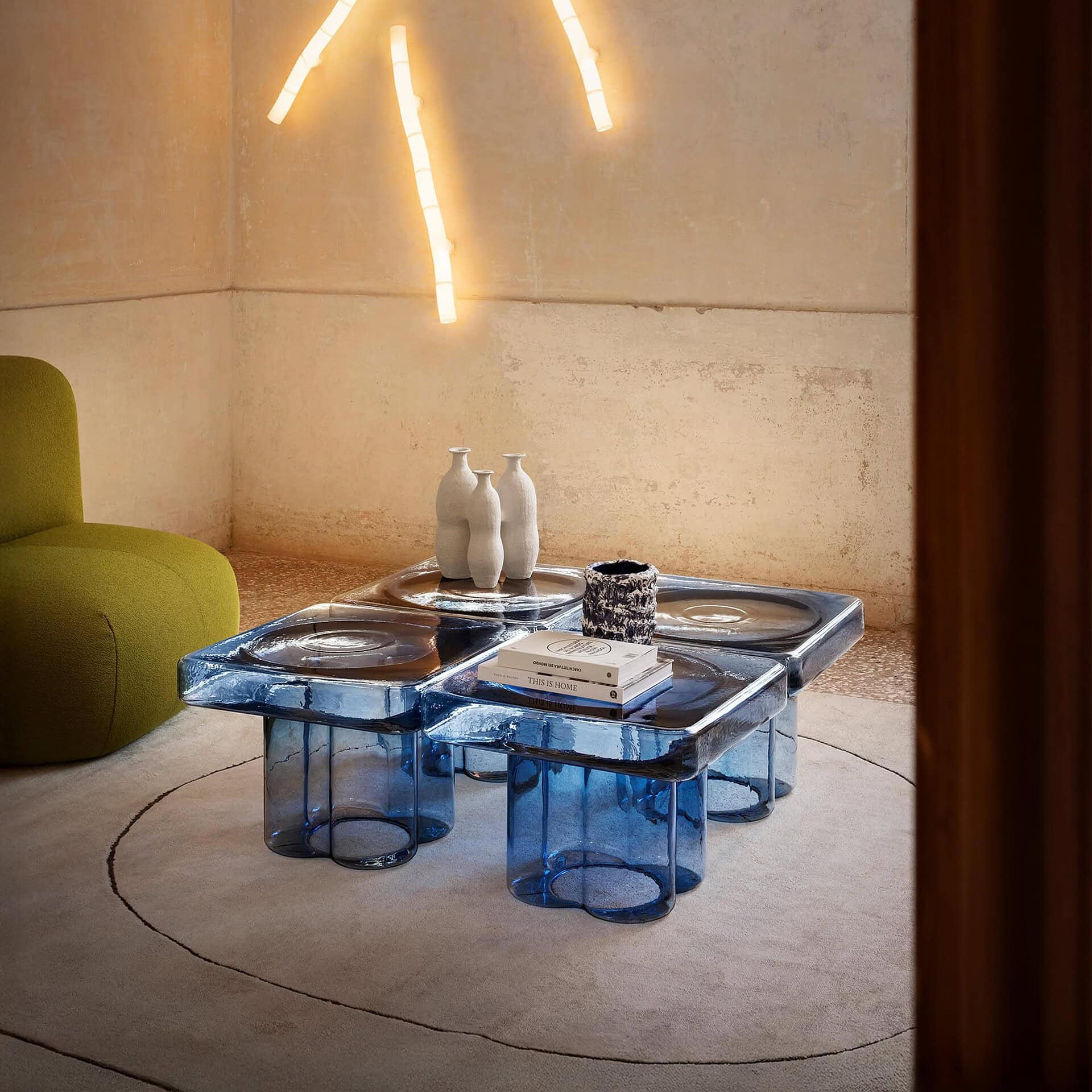 Blue Soda Square Coffee Table styled in a modern living room with soft lighting and minimalist decor.
