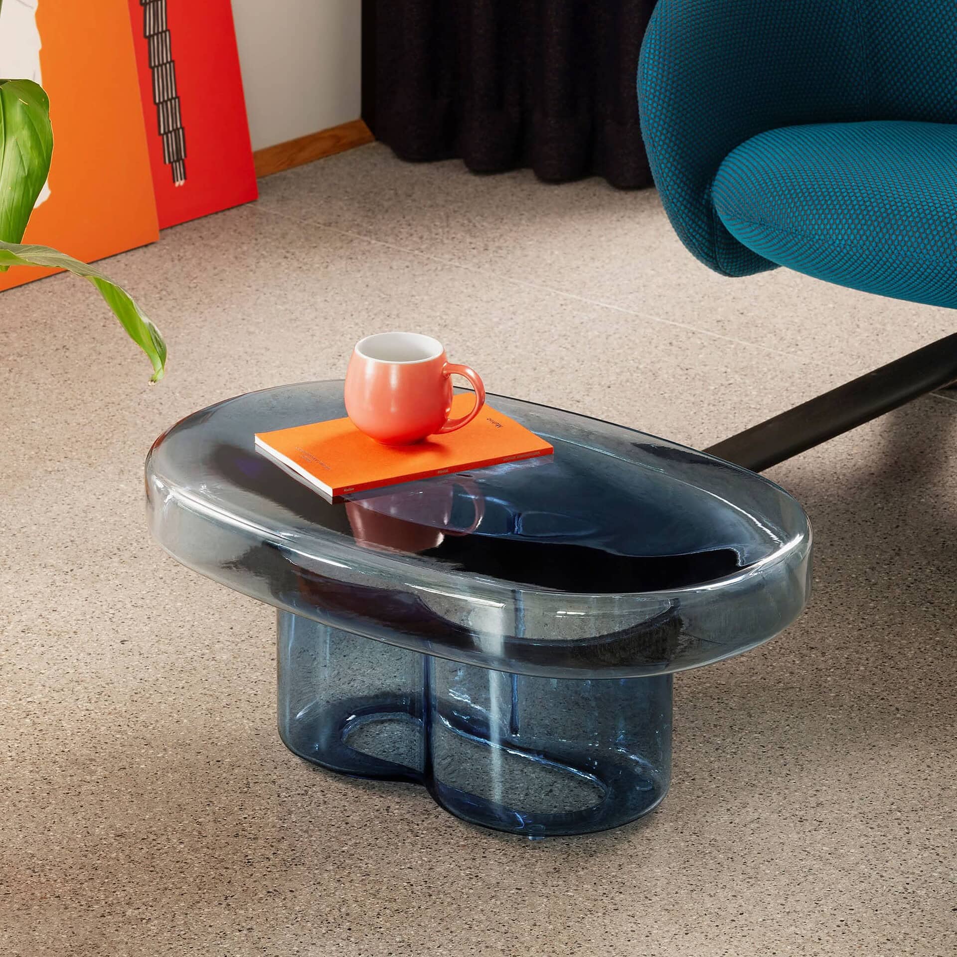 Blue Soda Oval Coffee Table styled in a modern room with colorful accents and decor.