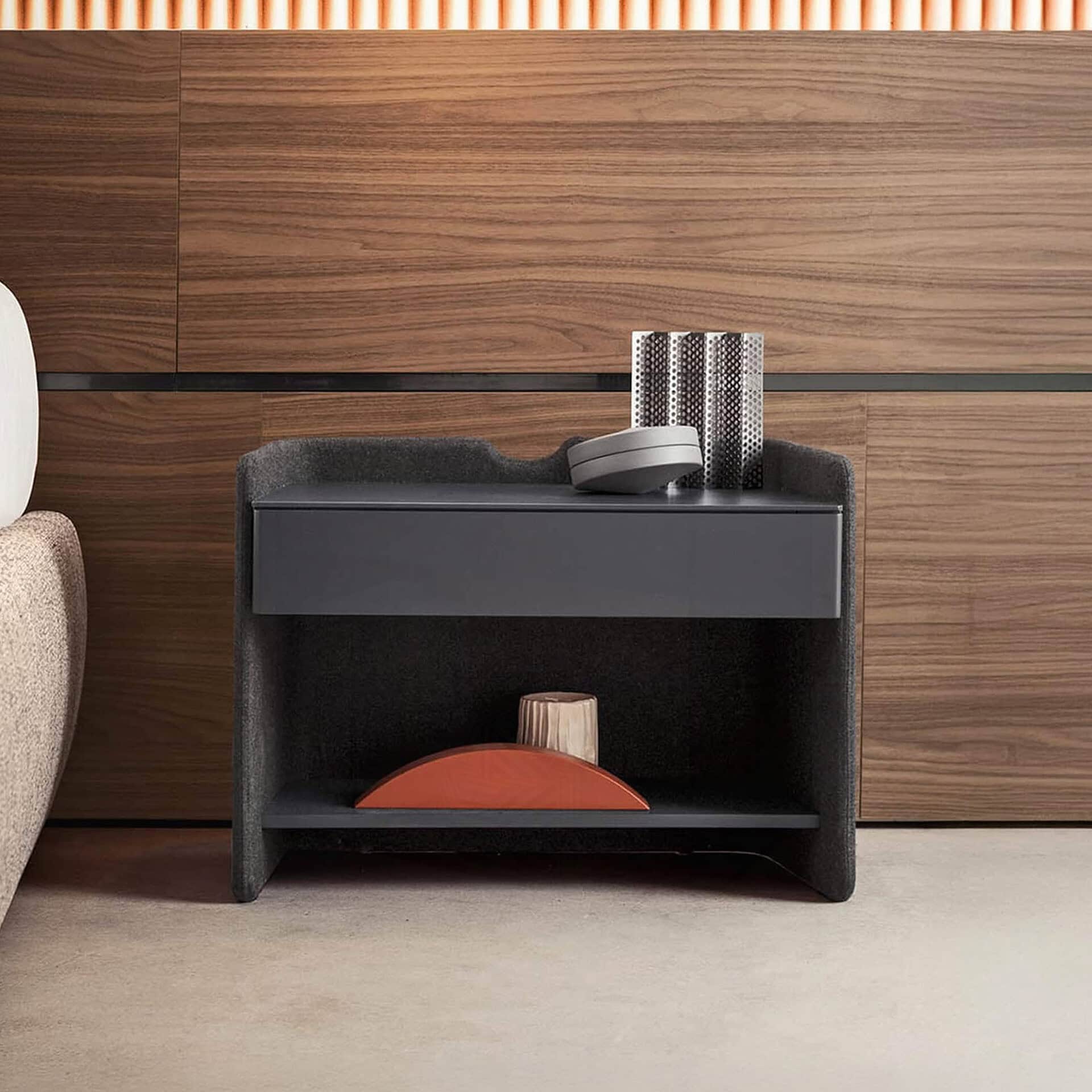 Upholstered 1-drawer nightstand with modern design, perfect for bedroom storage.