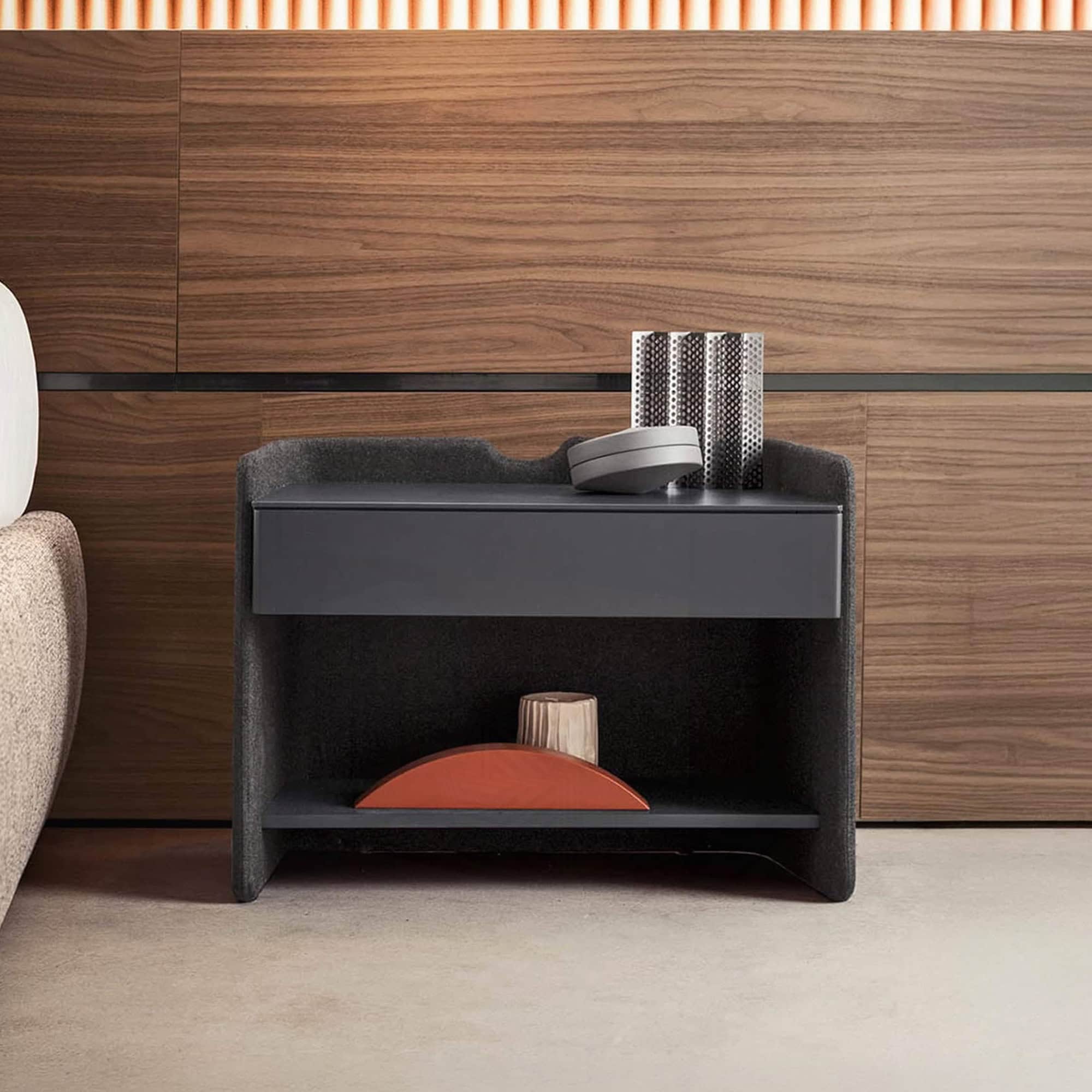Upholstered 1-drawer nightstand with modern design, perfect for bedroom storage.