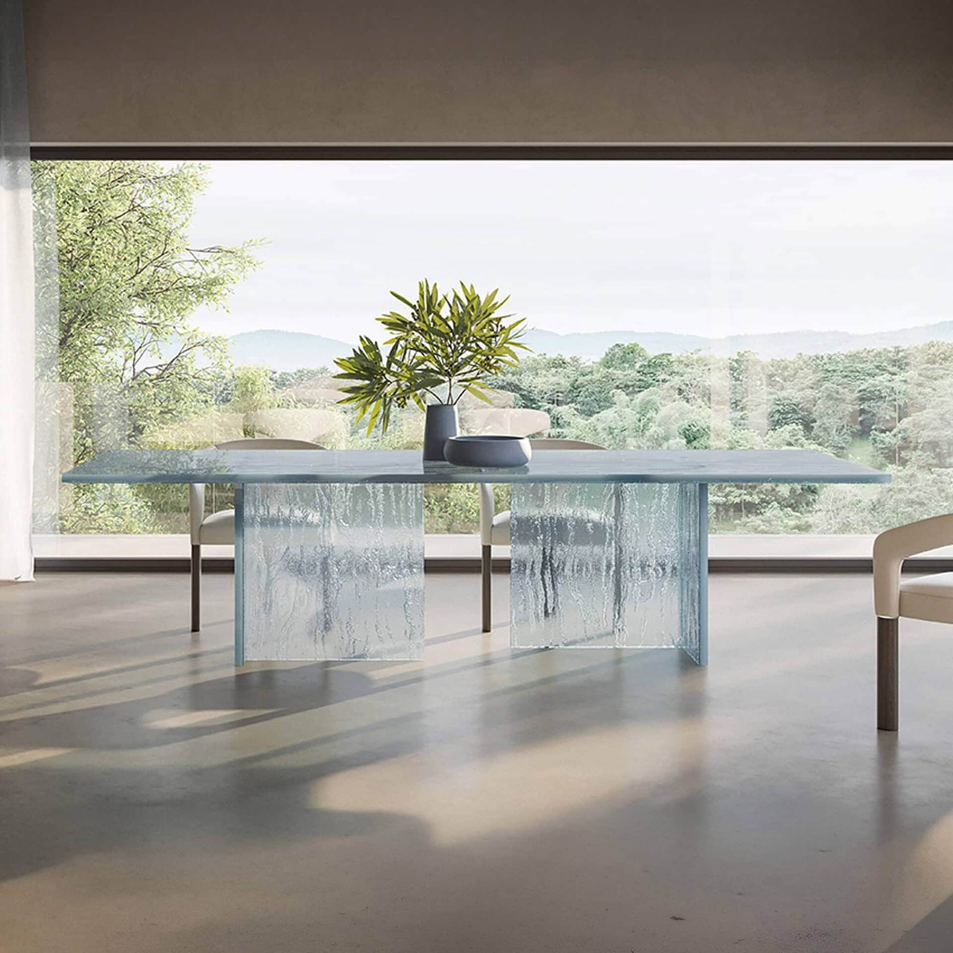 Laguna 72 glass dining table with modern design and clear glass finish. Perfect for contemporary din.