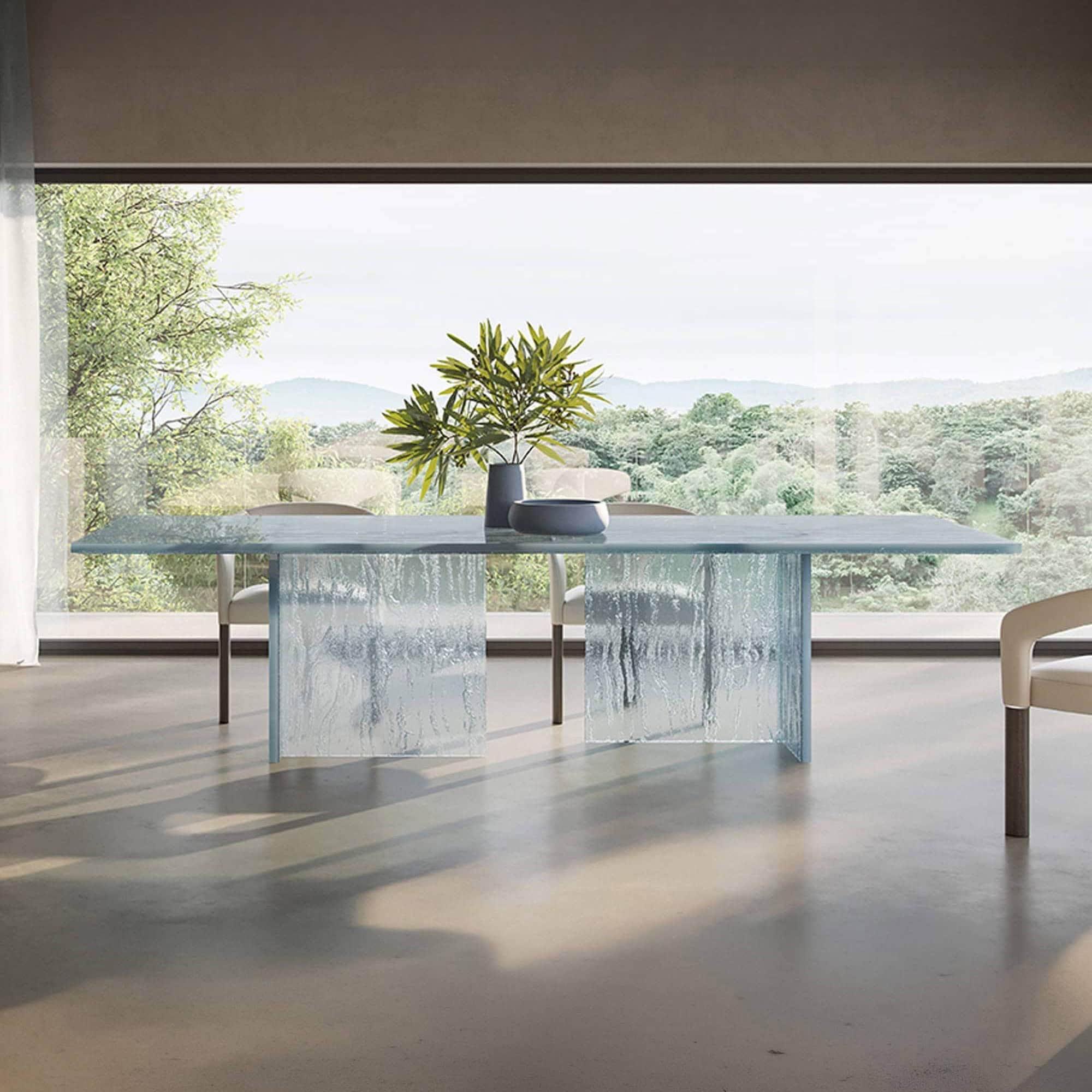 Laguna 72 glass dining table with modern design and clear glass finish. Perfect for contemporary din.