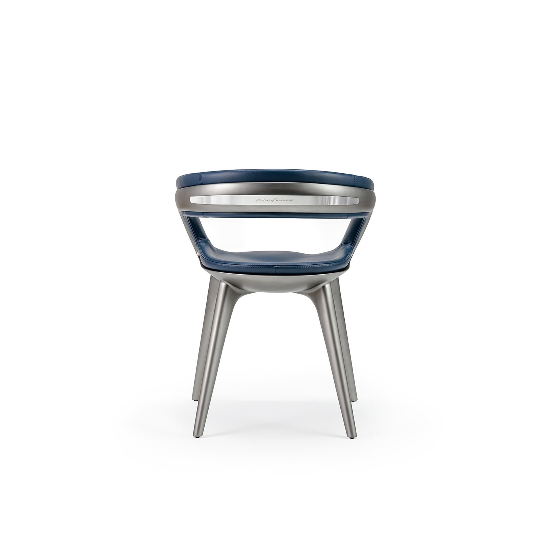 Rear view of the Nido Wood Dining Chair showcasing its sculptural wood frame and smooth metallic finish.