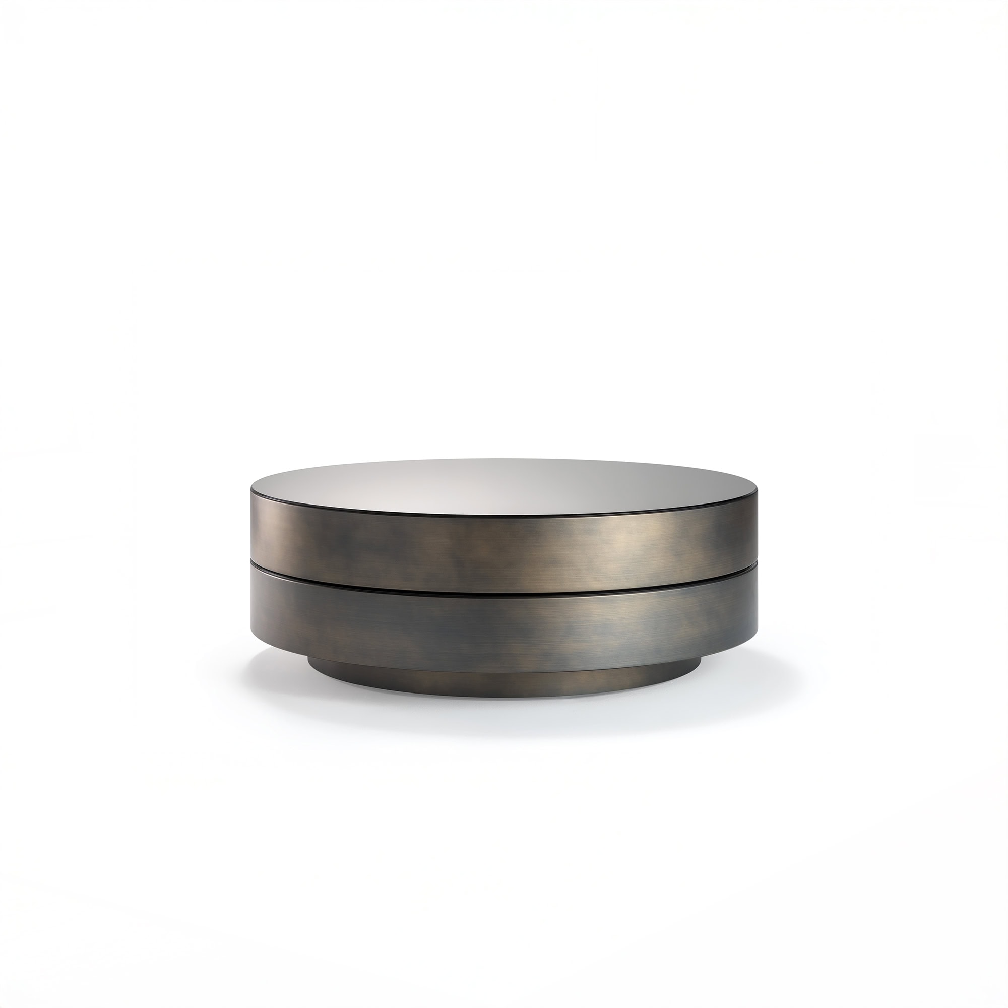 Sleek metallic round coffee table with modern design for contemporary living spaces.
