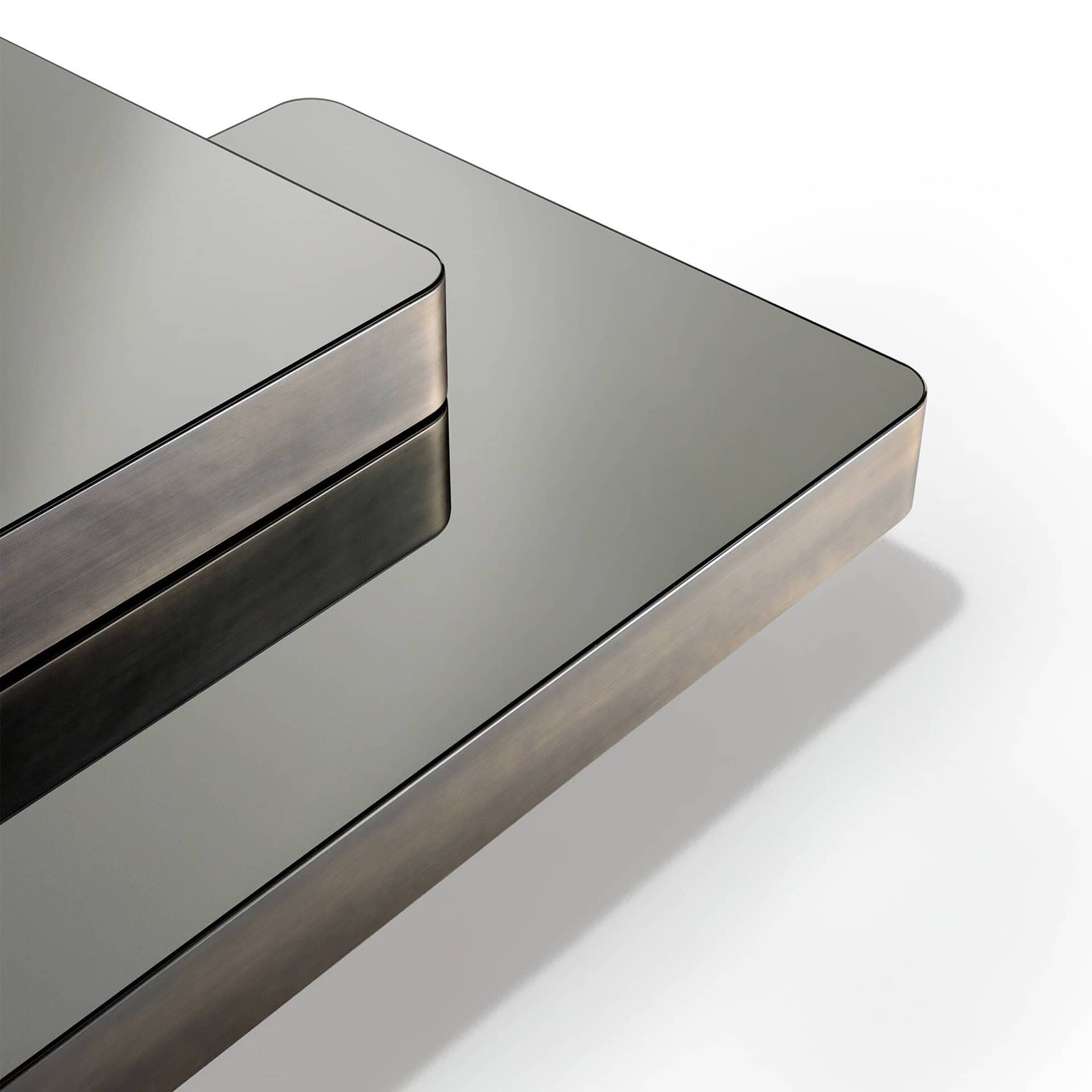 Brushed stainless steel coffee table with sleek modern design.
