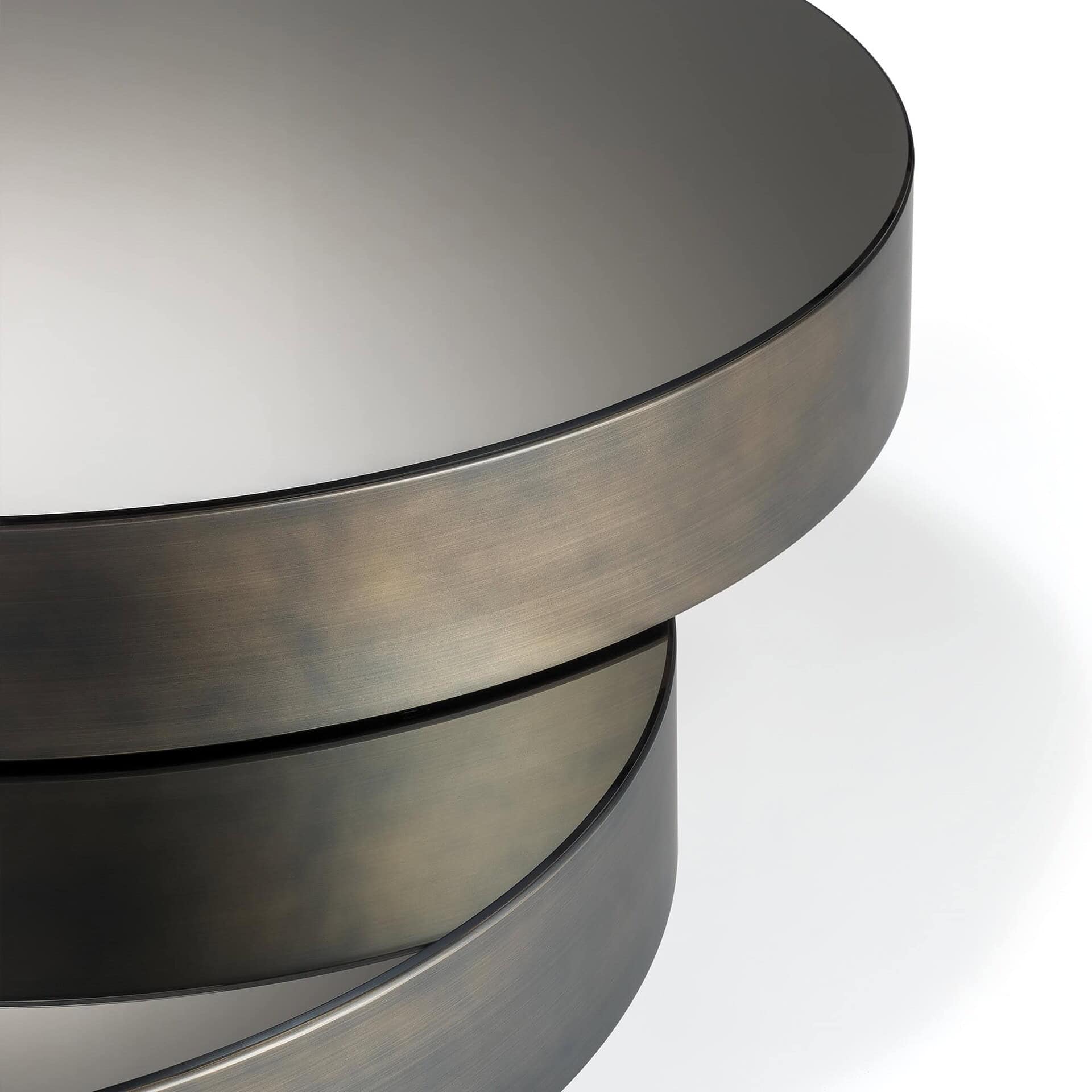 Sleek modern metallic furniture with rounded edges for contemporary interior design.