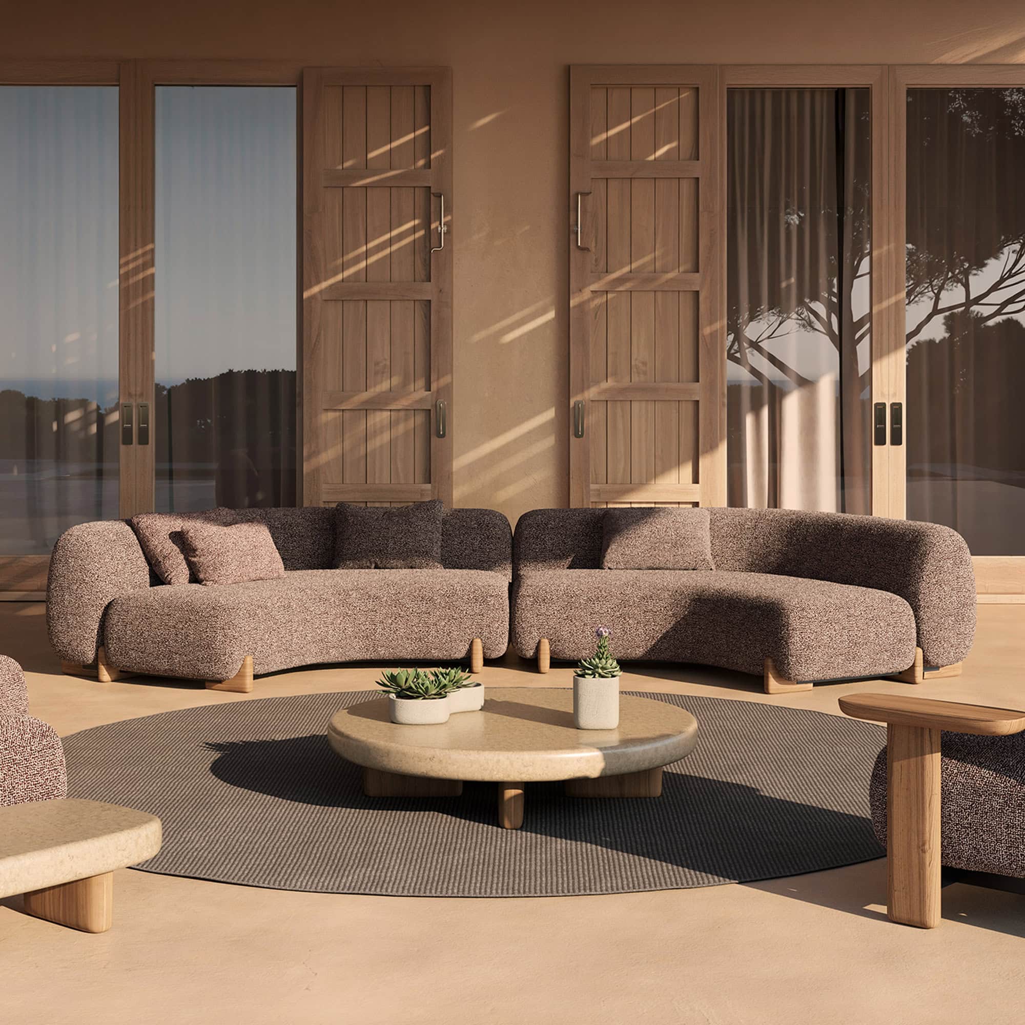 Milos outdoor sectional sofa with plush cushions in a modern patio setting.