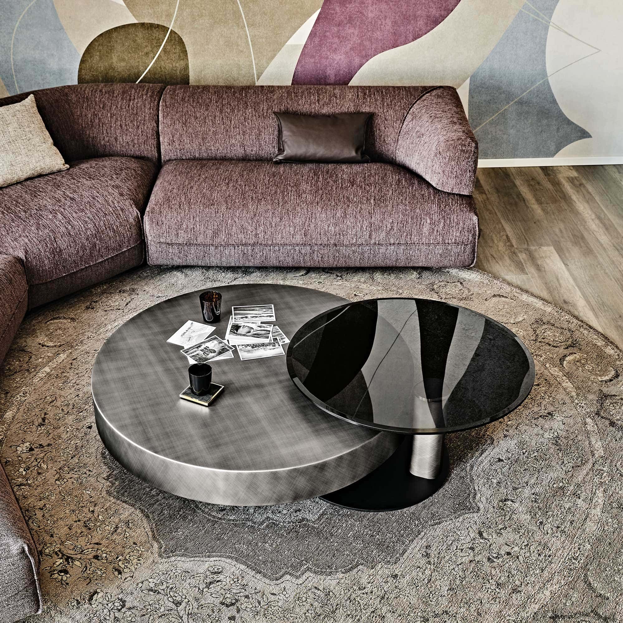 a couch with a round coffee table