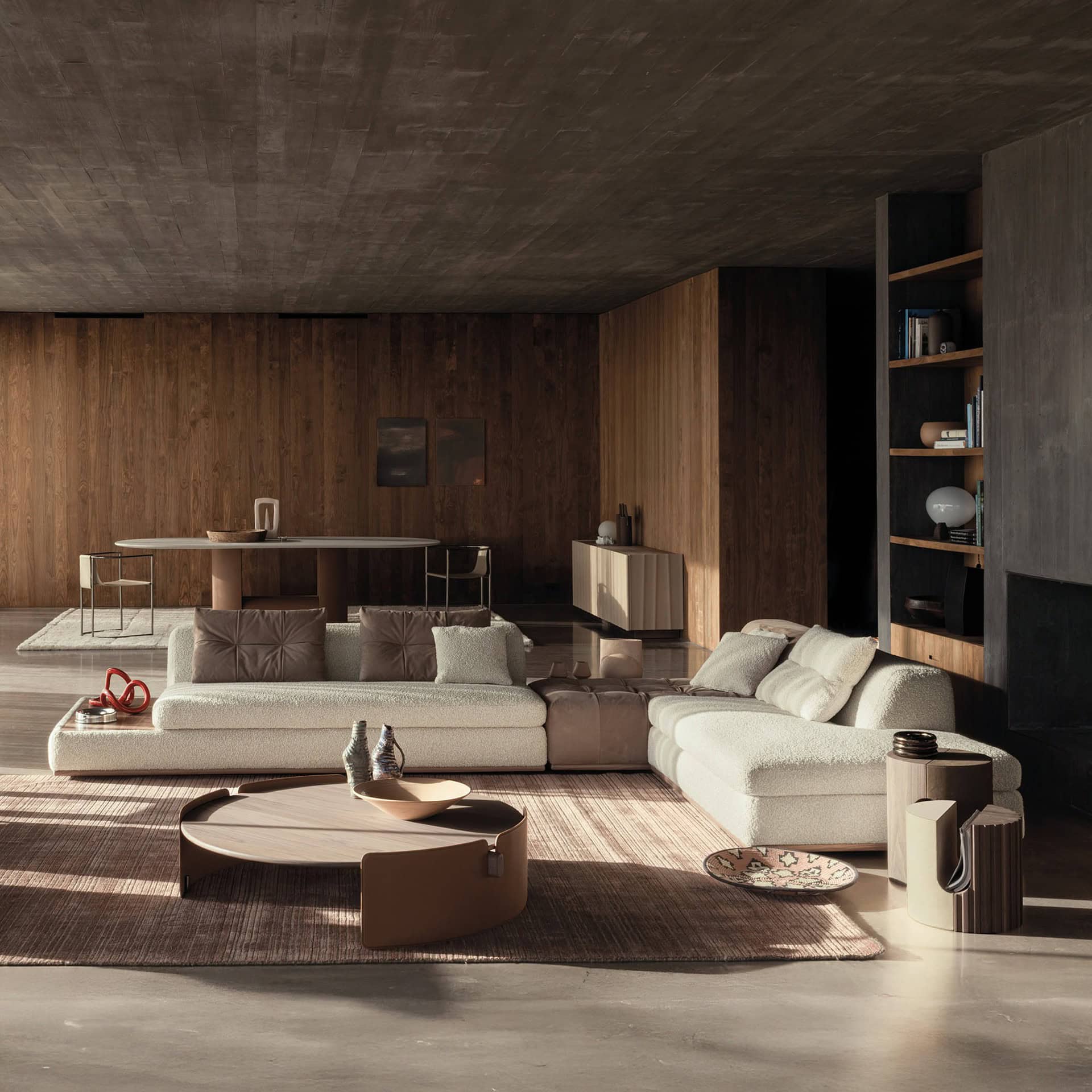 Montgomery Modular Sectional Sofa in beige fabric with chaise lounge and round coffee tables in a modern living room