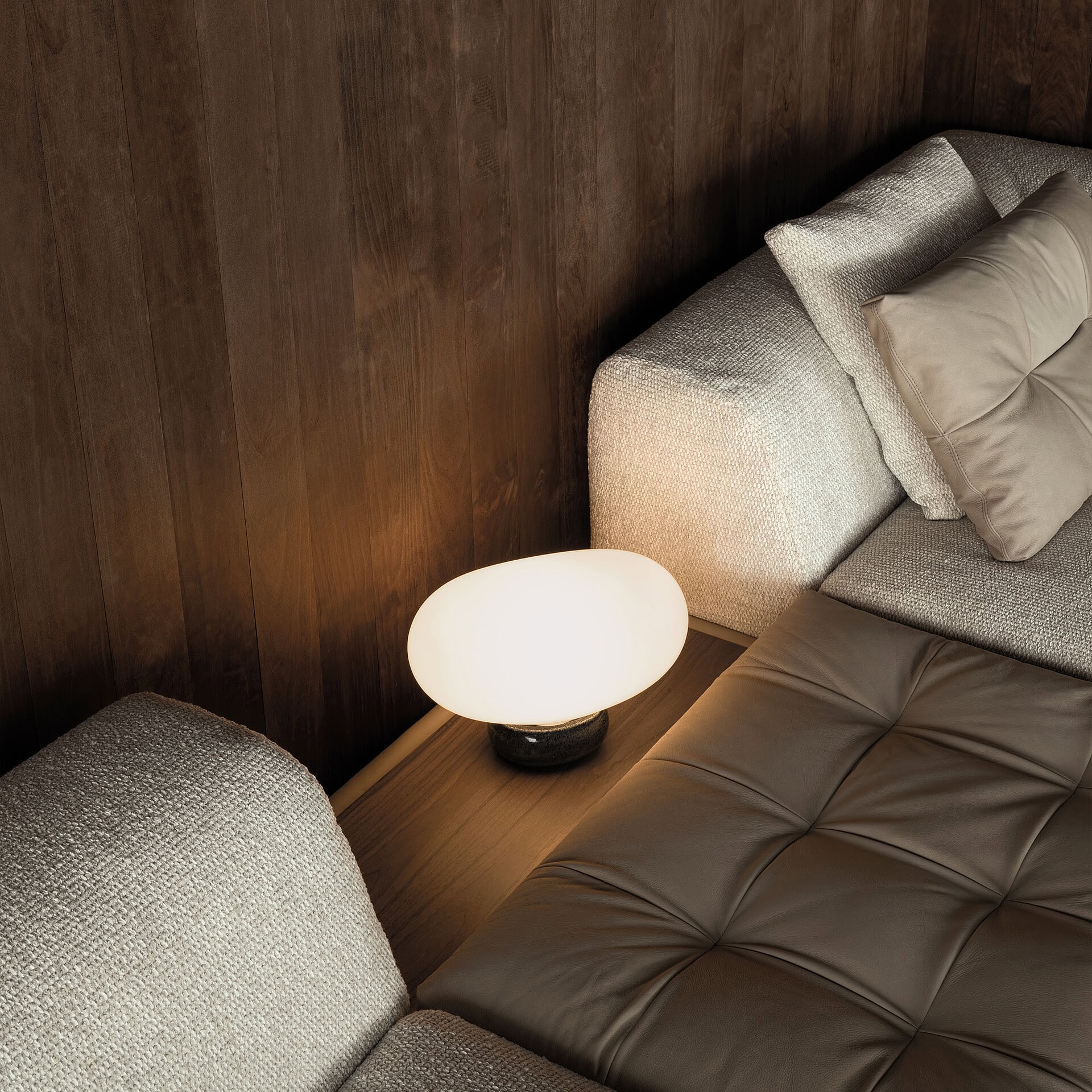 Close-up of quilted leather cushion detail on Montgomery Sectional Sofa