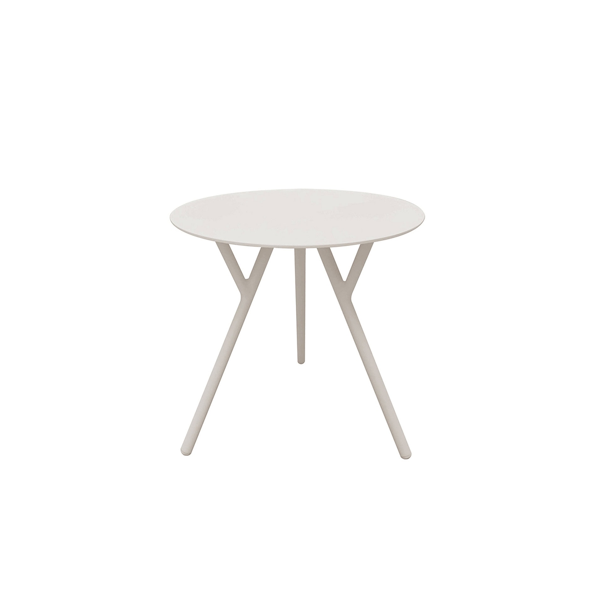 White modern round side table with angled legs for living room decor.