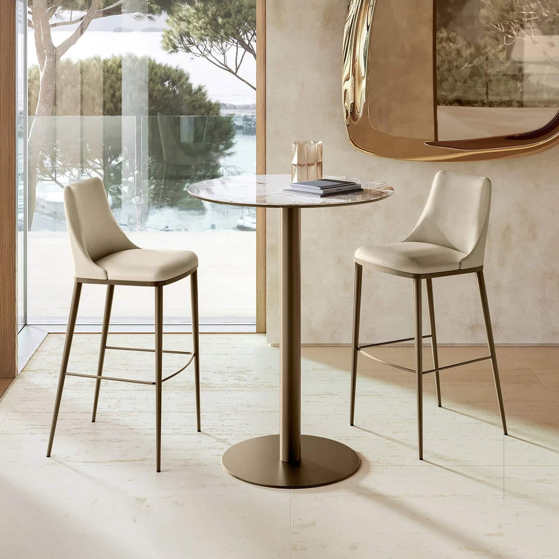 Sleek modern dining chairs with marble-top table in contemporary interior design.