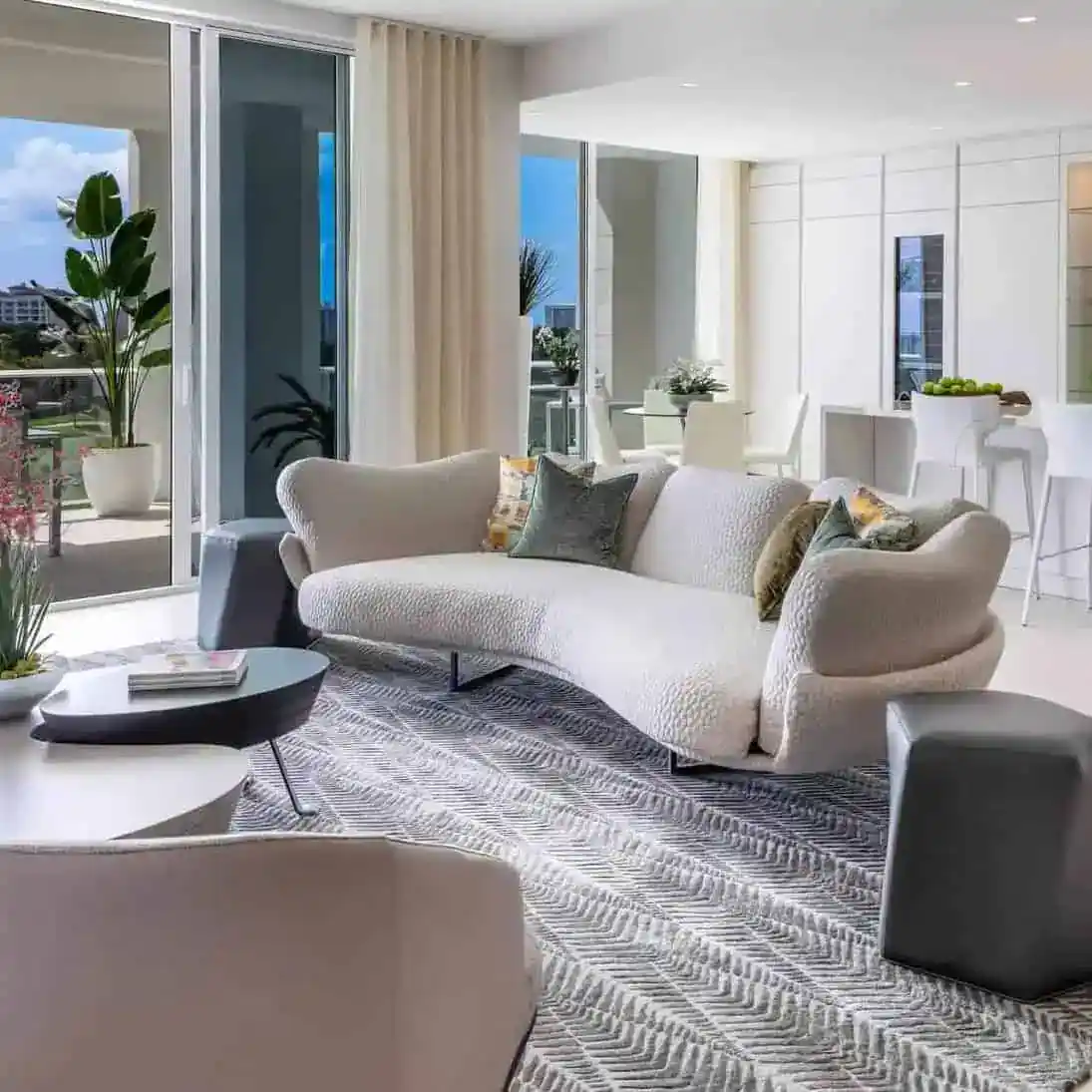 a living room with a couch and a rug