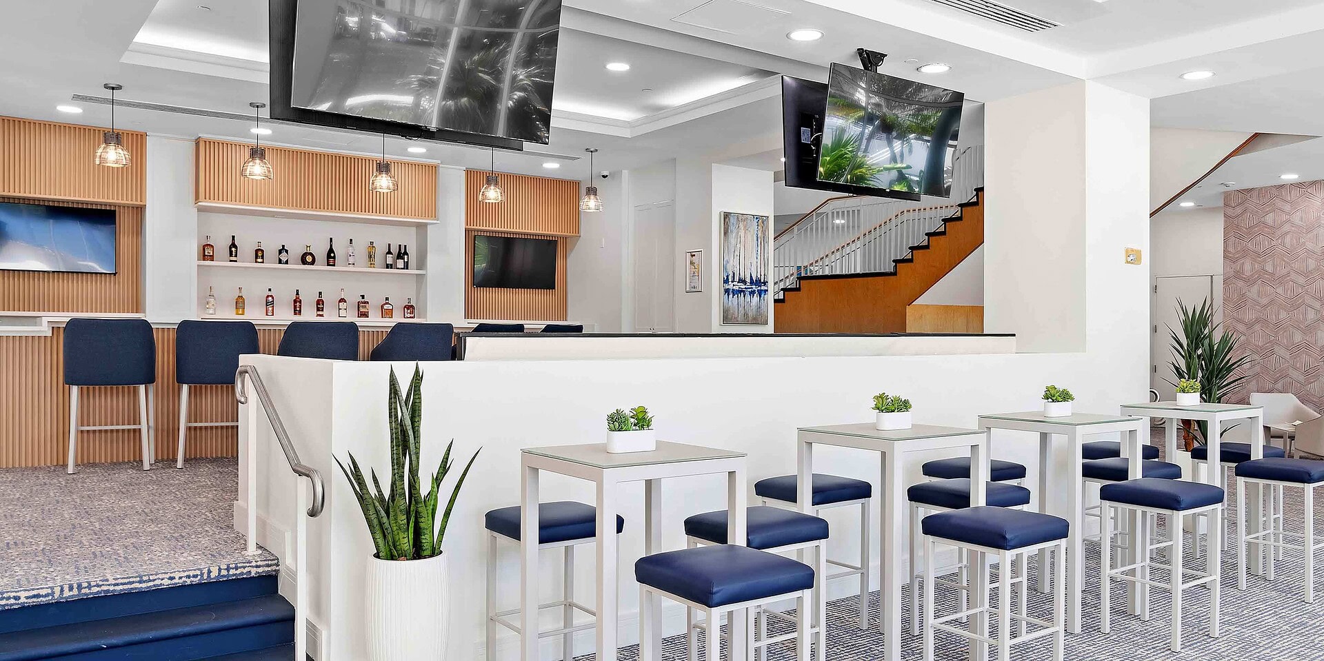 a room with a wall and a television