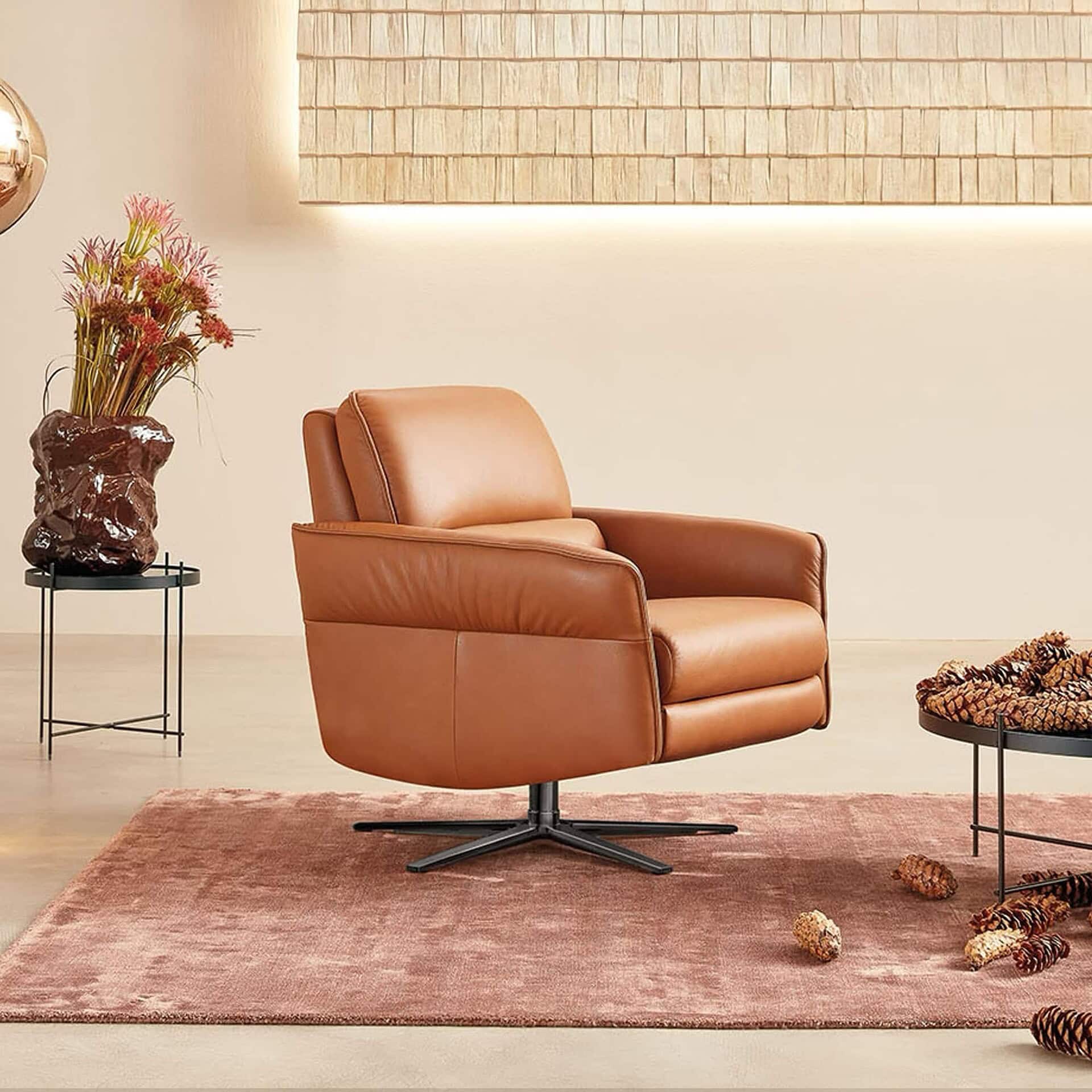 Front angle of the Aura 8536 Recliner Chair in a warm-toned interior.