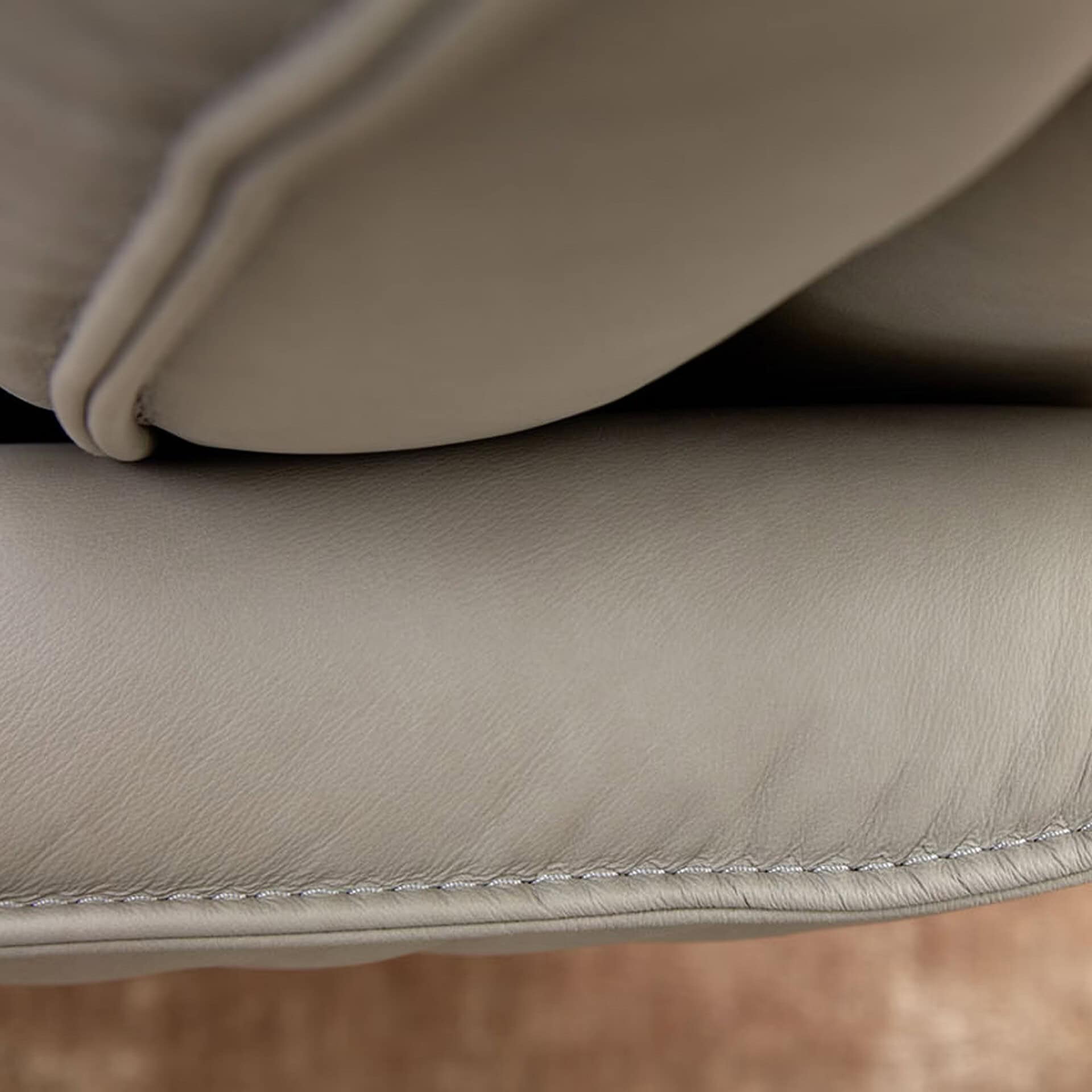 Close-up of premium stitching on the Aura 8536 Recliner Chair upholstery.