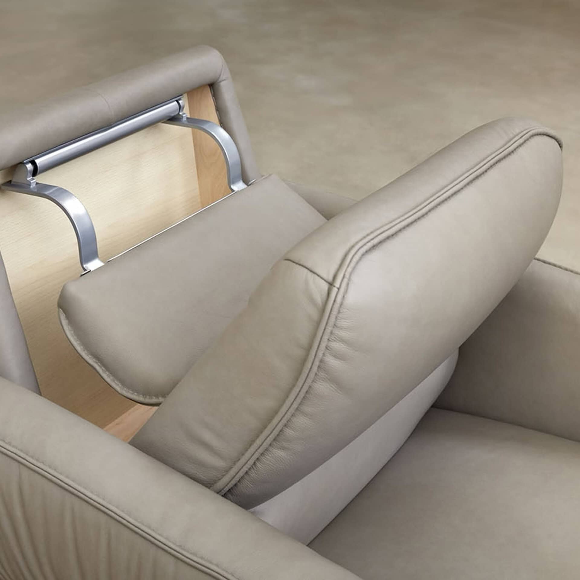 Detail view of the Aura 8536 Recliner Chairr’s integrated stowable headrest.