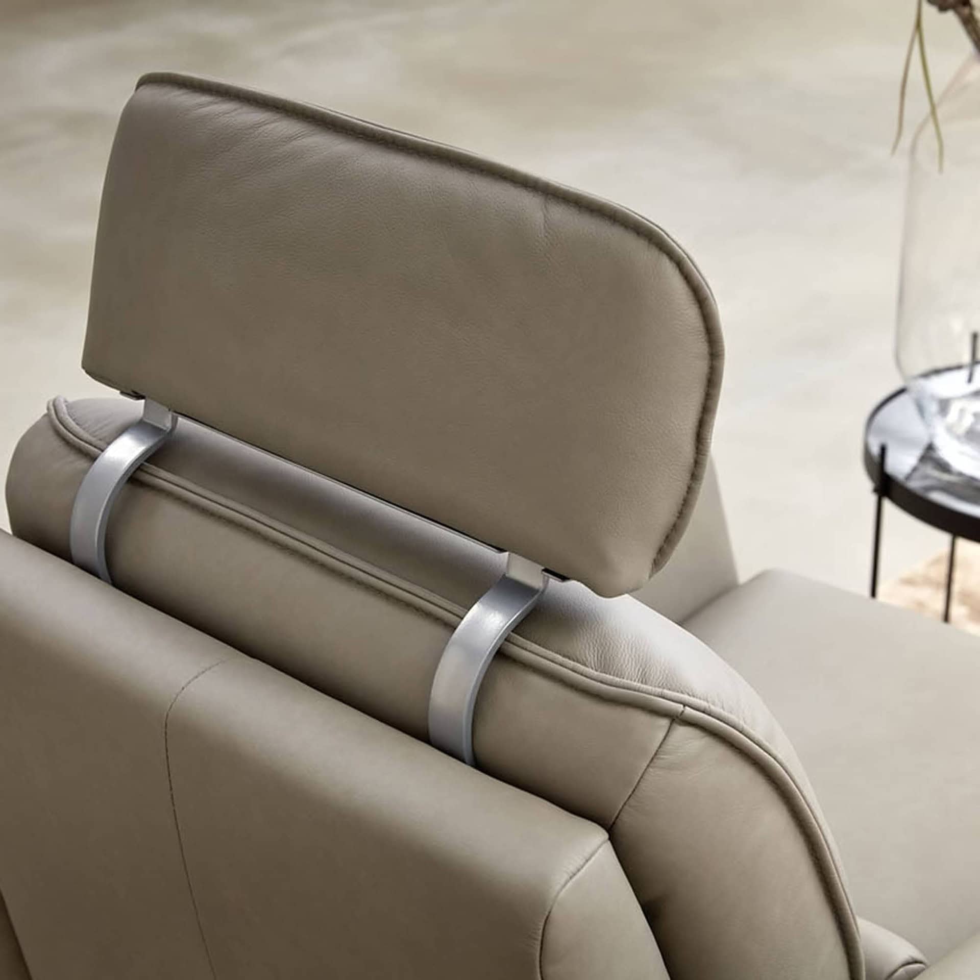 Back view of the Aura 8536 Recliner Chair highlighting headrest mechanism.