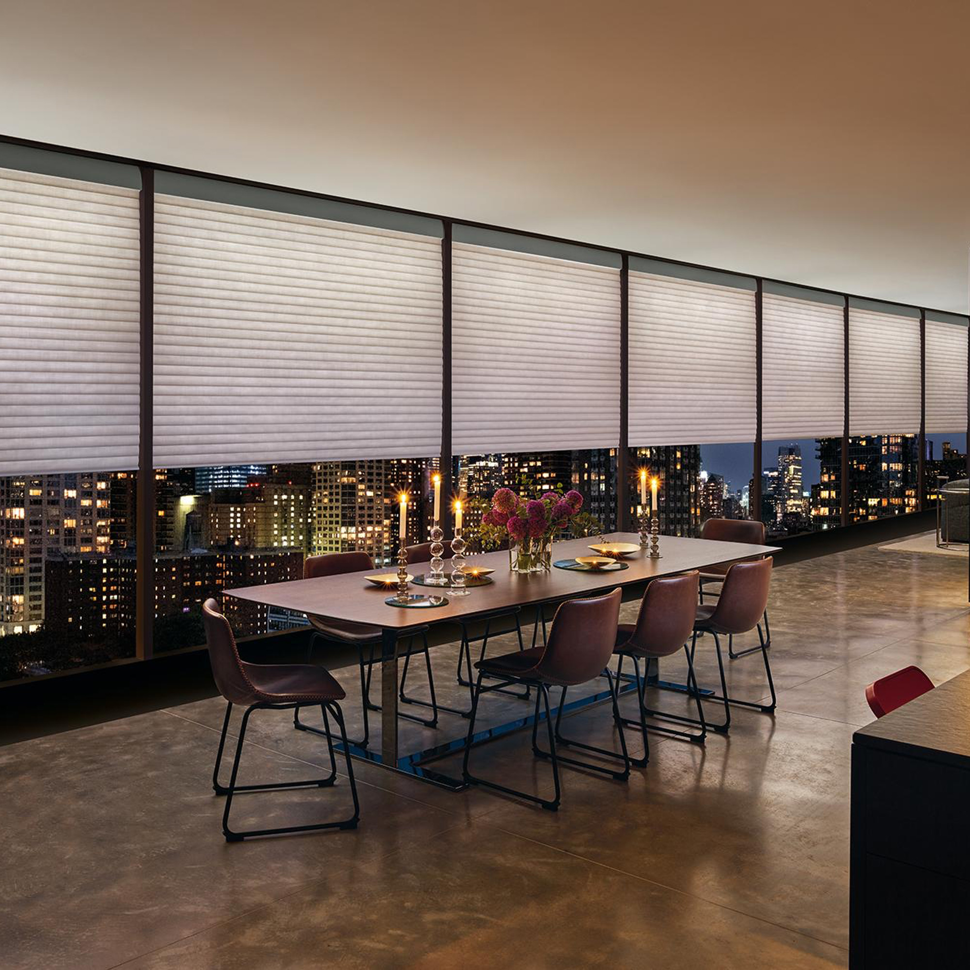 a dining room with a table and chairs