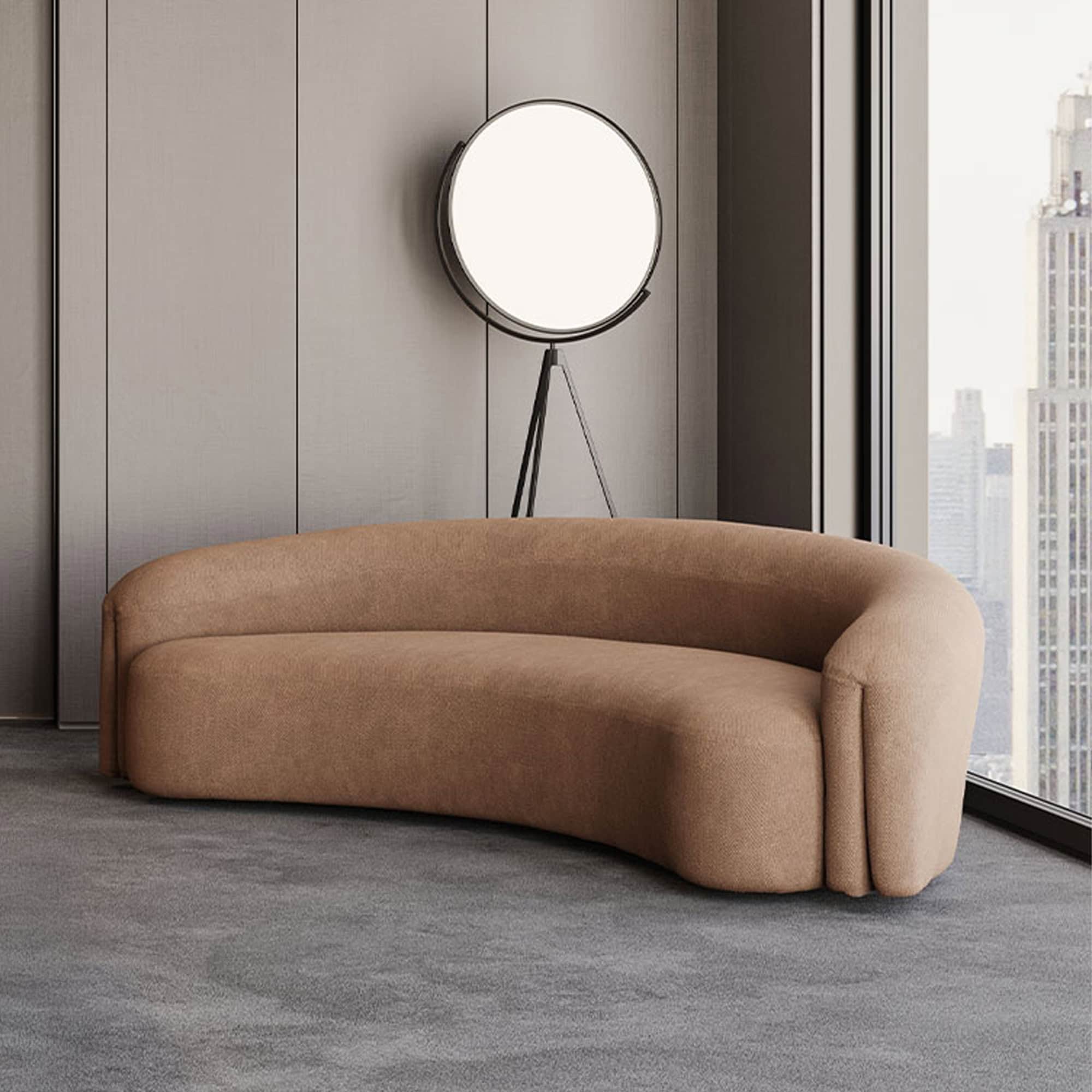 Light brown Quentin Curved Upholstered Sofa showcased in a neutral modern living space.