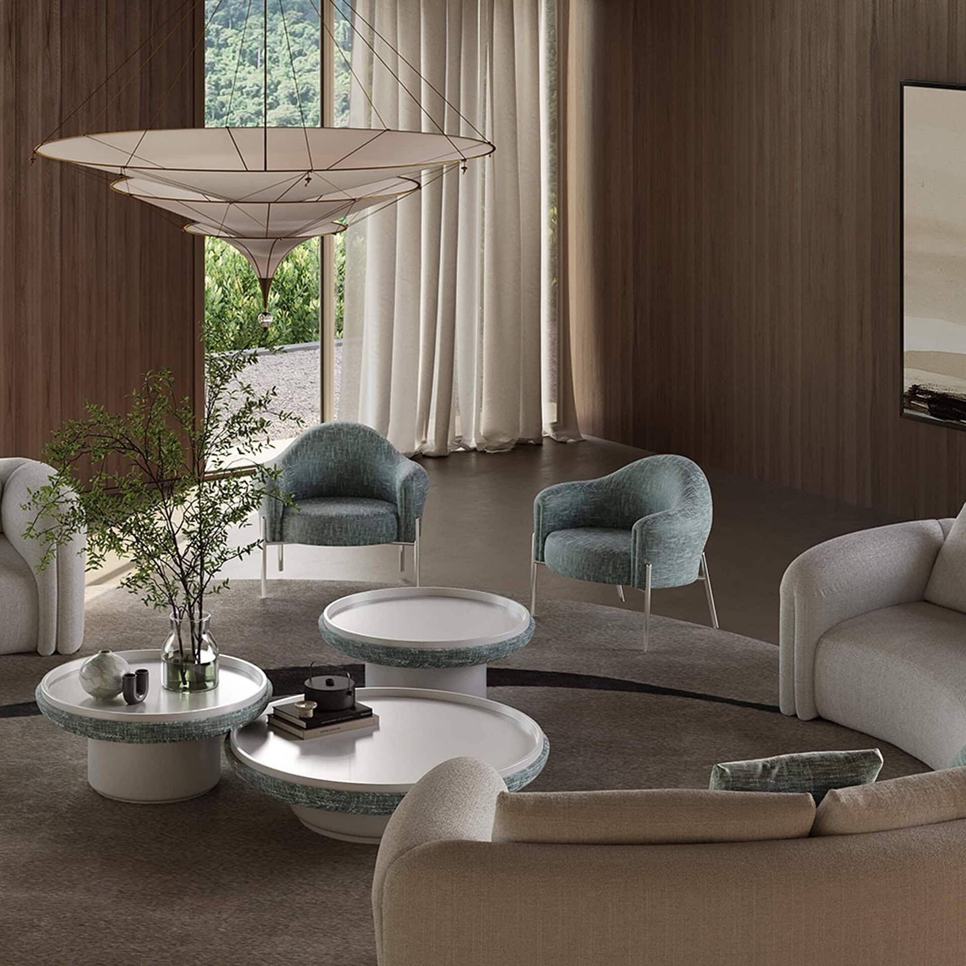 Quentin Upholstered Armchairs styled in a living room with soft natural lighting and light upholstery.